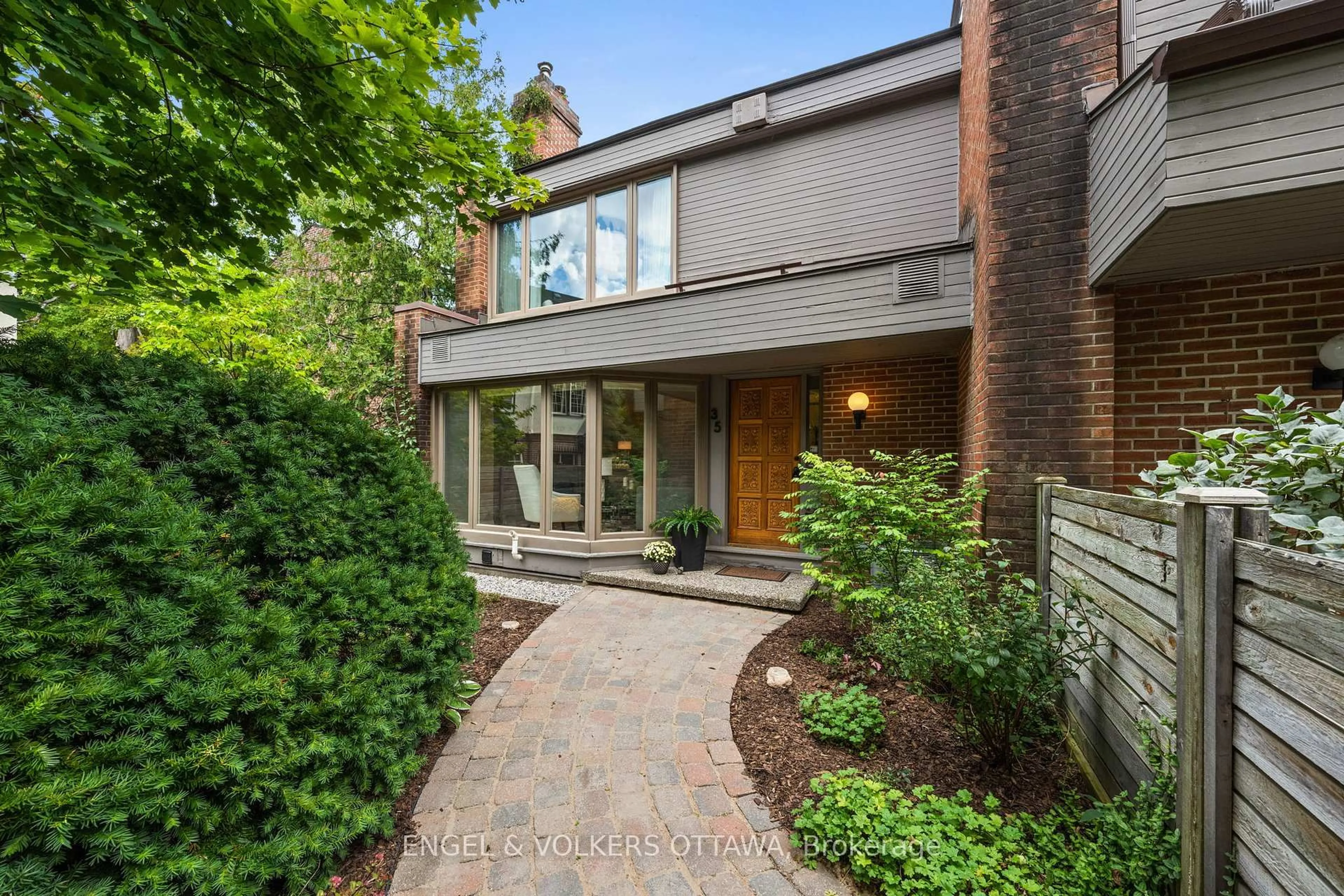 Home with brick exterior material, street for 35 Belvedere Cres #35, Ottawa Ontario K1M 0E5