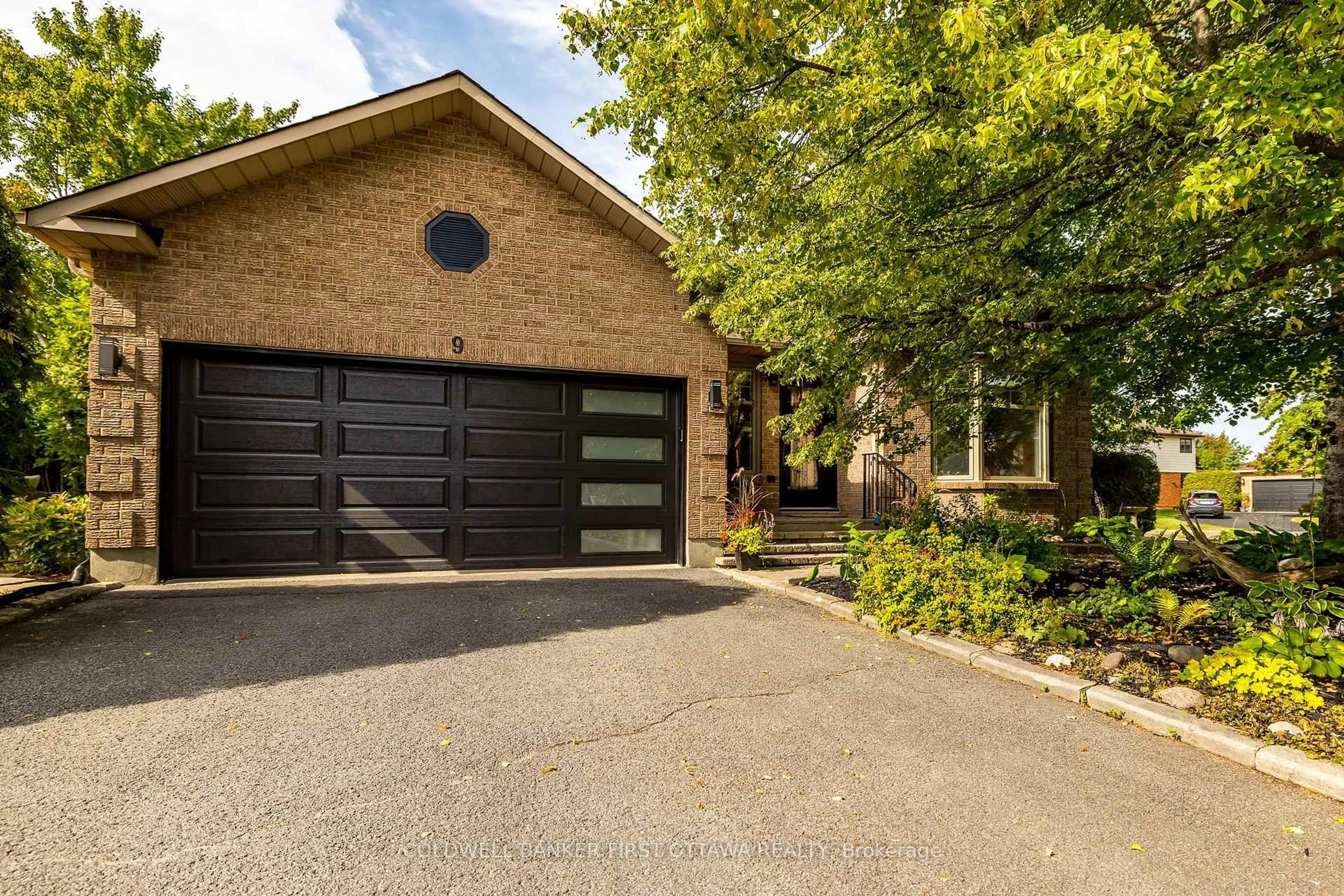 Home with brick exterior material, street for 9 Lone Meadow Tr, Ottawa Ontario K2S 1C9