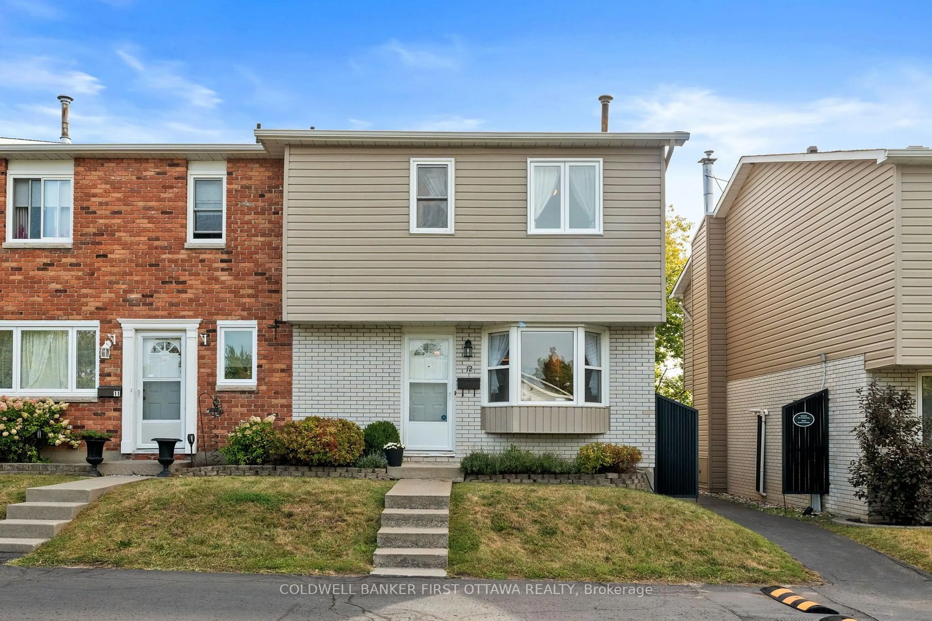 Home with brick exterior material, street for 550 Straby Ave #12, Ottawa Ontario K1K 1H1