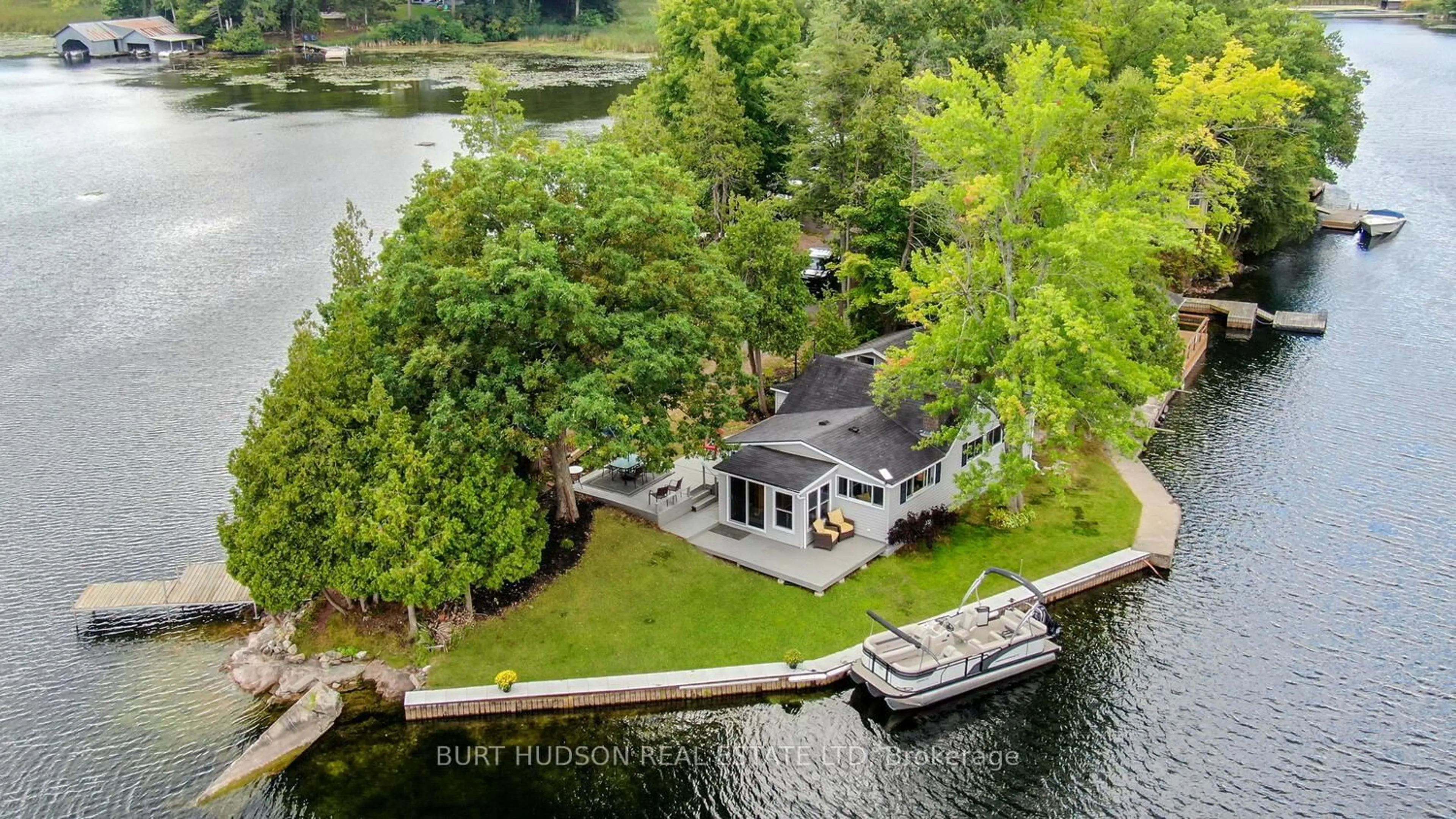 A pic from outside/outdoor area/front of a property/back of a property/a pic from drone, water/lake/river/ocean view for 110 Greer Point Lane, Leeds and the Thousand Islands Ontario K0E 1L0