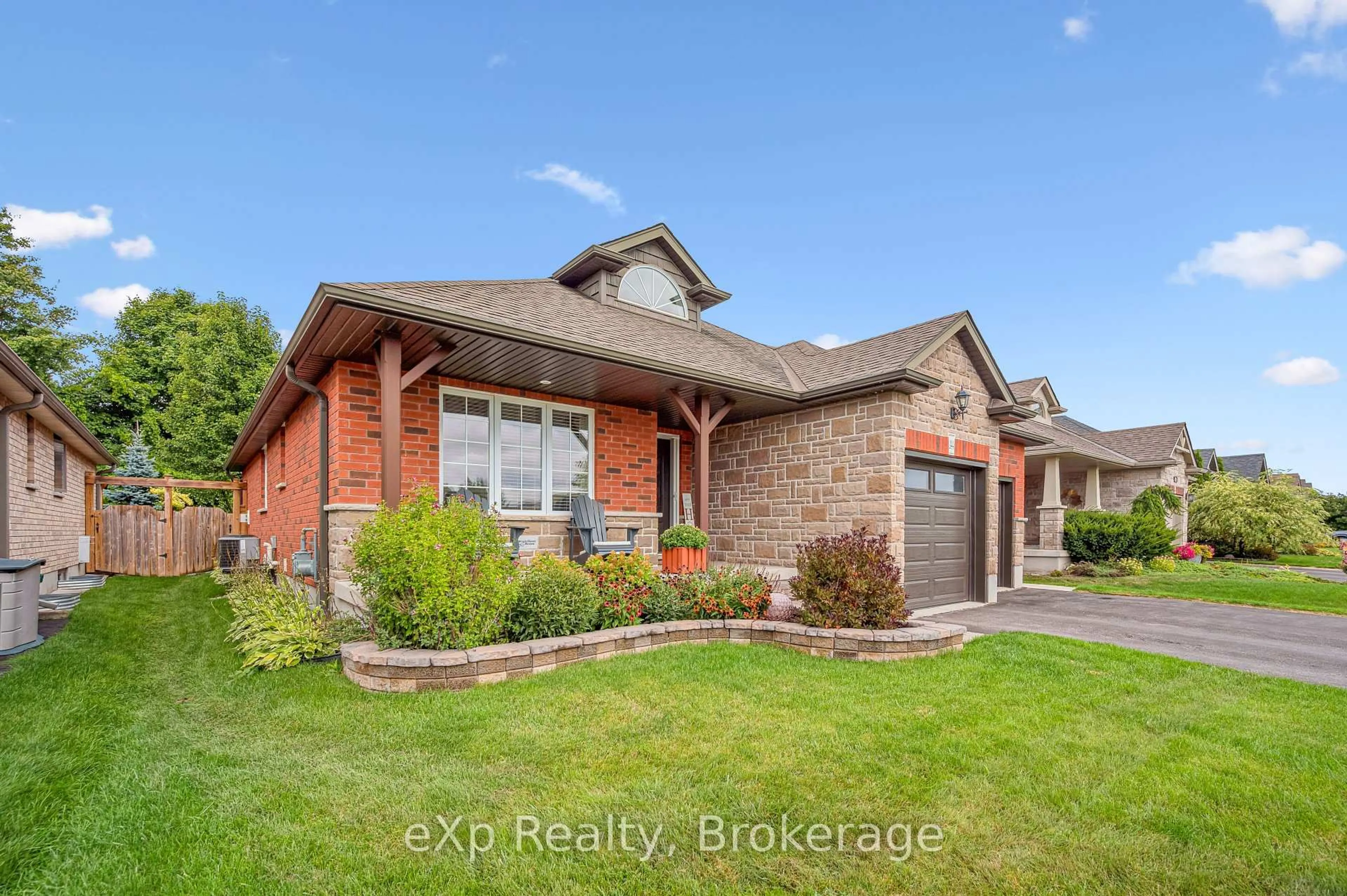 Home with brick exterior material, street for 144 Spencer Dr, Centre Wellington Ontario N0B 1S0