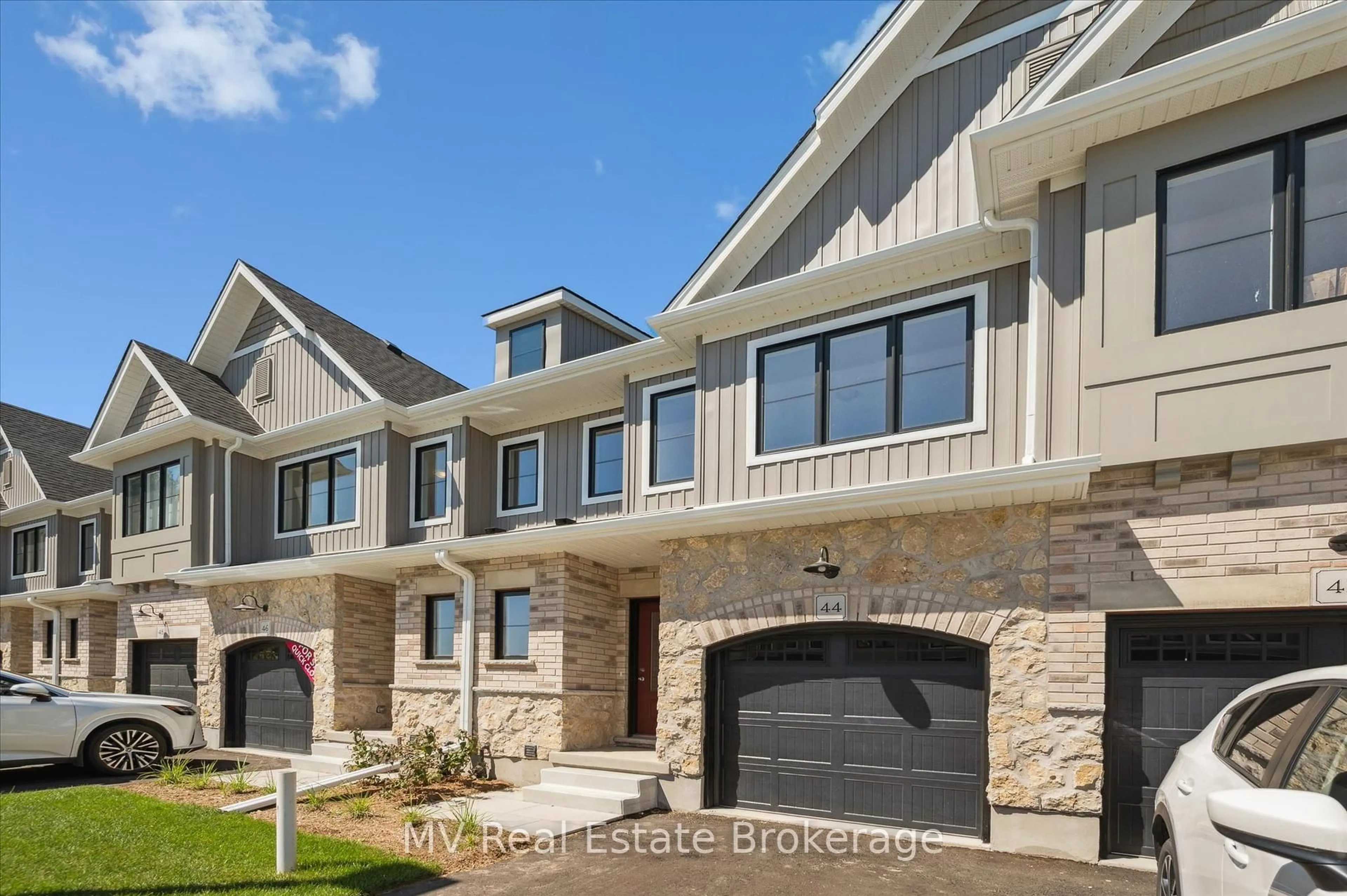 Home with brick exterior material, street for 44 Fieldstone Lane Private, Centre Wellington Ontario N0B 1S0