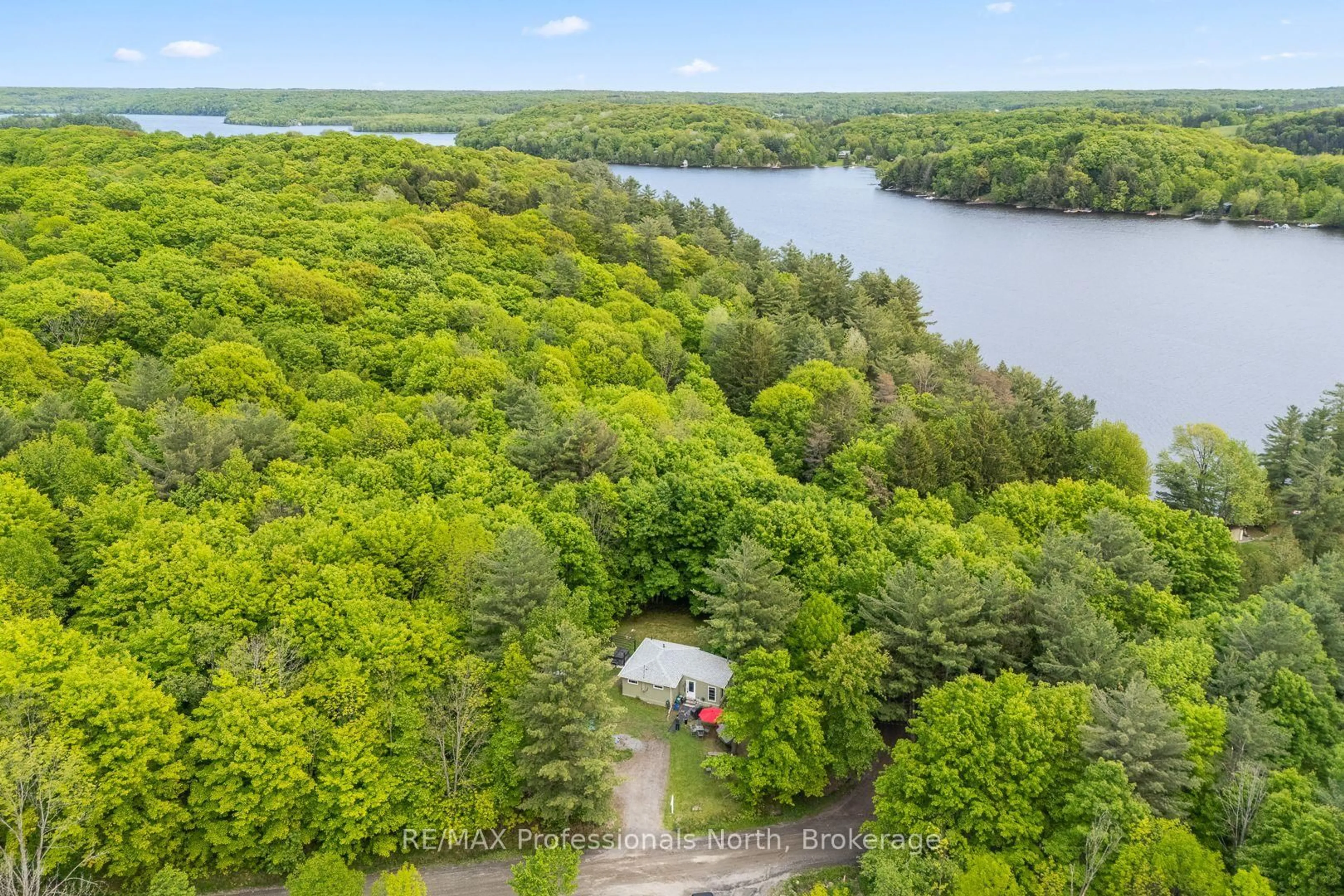 A pic from outside/outdoor area/front of a property/back of a property/a pic from drone, water/lake/river/ocean view for 1053 Cutler Rd, Muskoka Lakes Ontario P0B 1M0