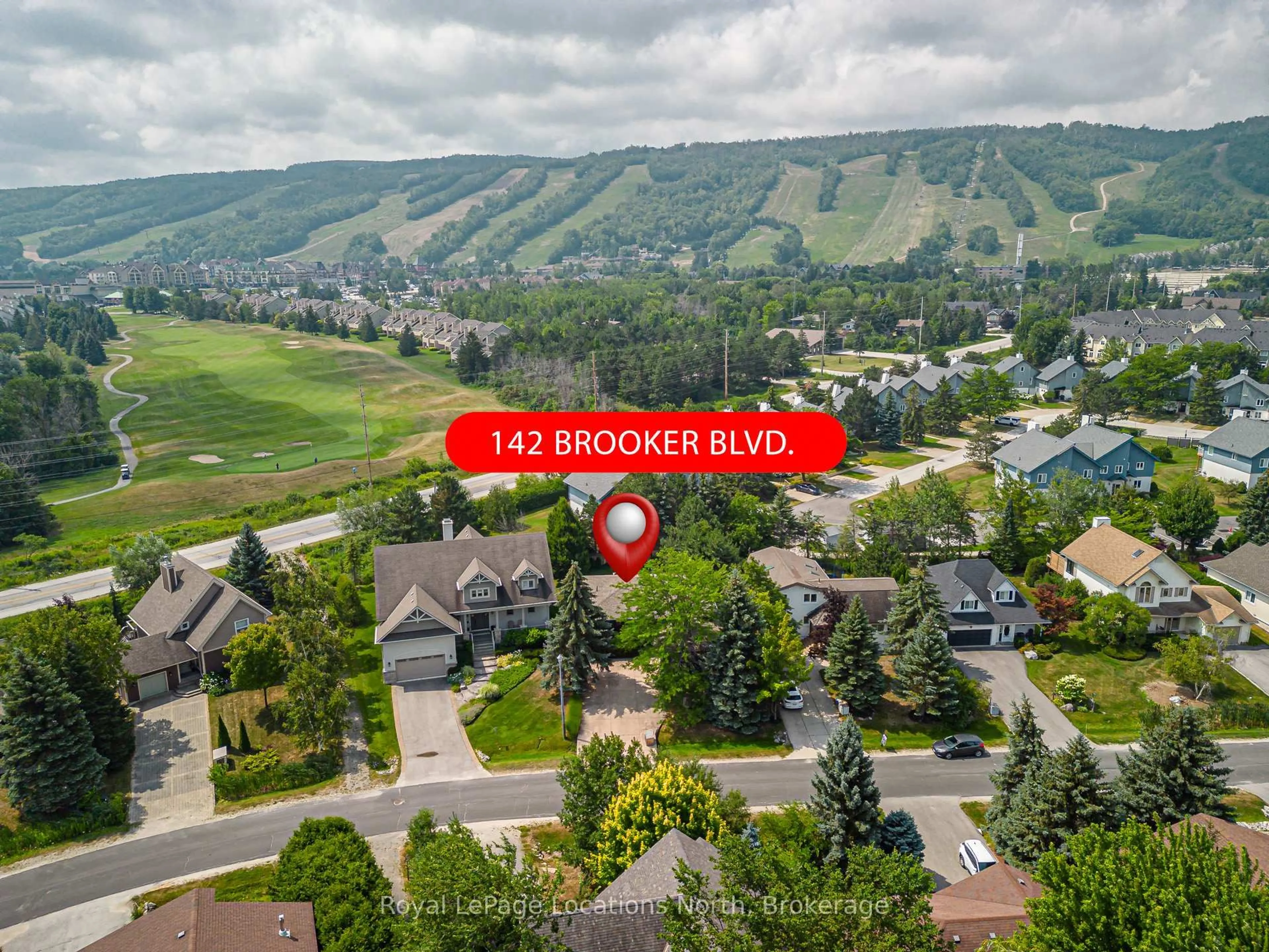 A pic from outside/outdoor area/front of a property/back of a property/a pic from drone, mountain view for 142 Brooker Blvd, Blue Mountains Ontario L9Y 0L4