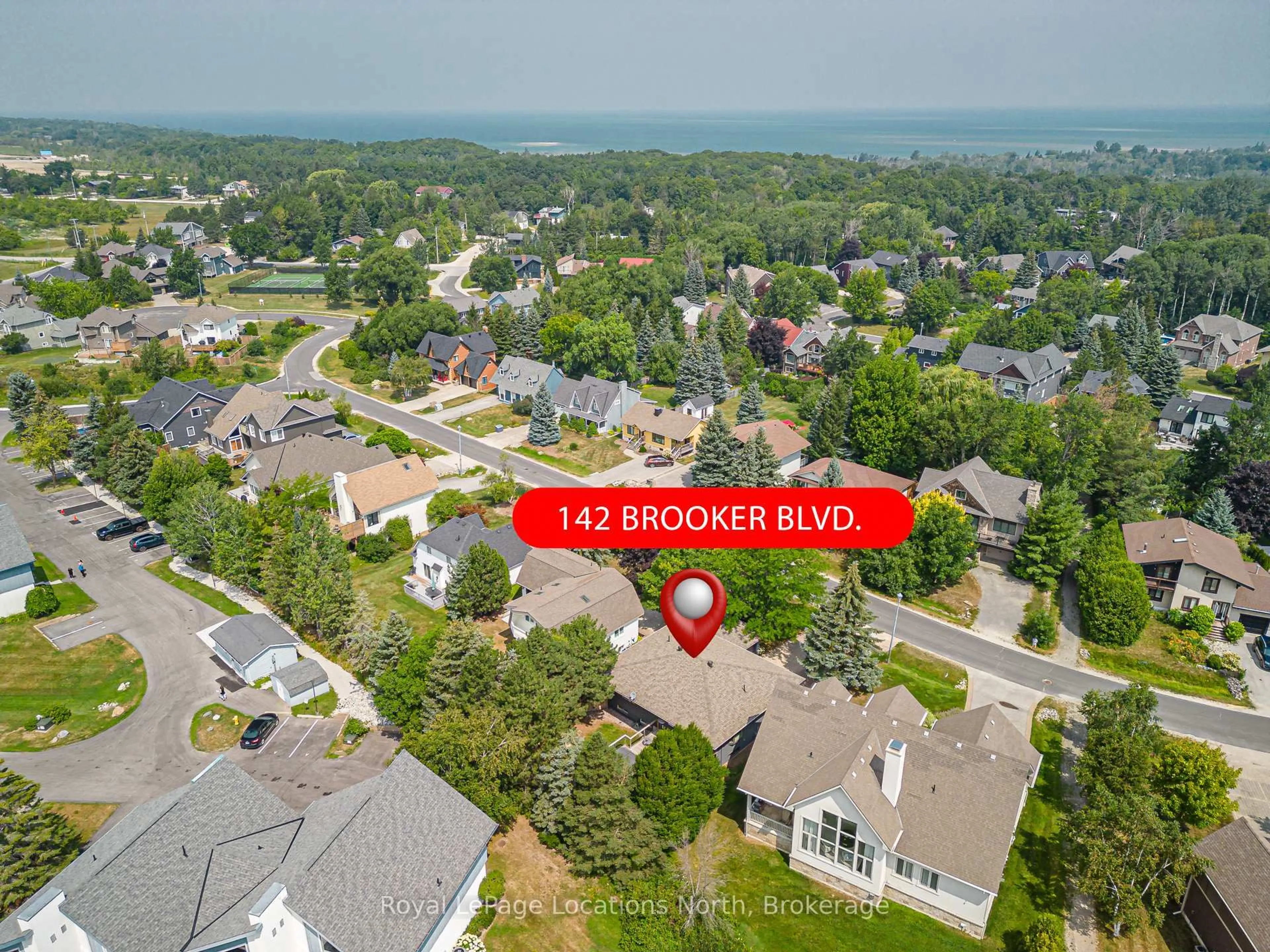 A pic from outside/outdoor area/front of a property/back of a property/a pic from drone, street for 142 Brooker Blvd, Blue Mountains Ontario L9Y 0L4