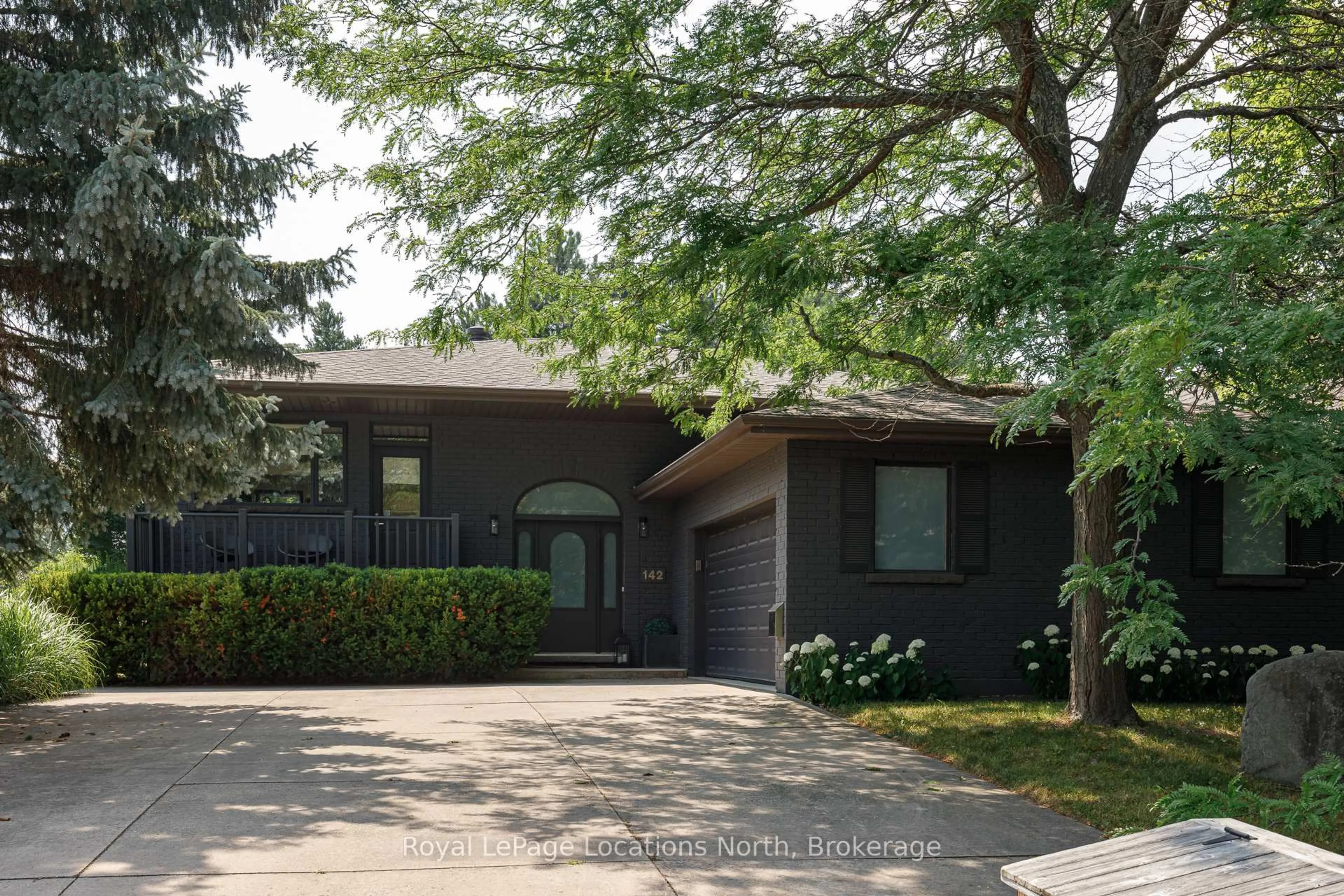 Home with brick exterior material, street for 142 Brooker Blvd, Blue Mountains Ontario L9Y 0L4