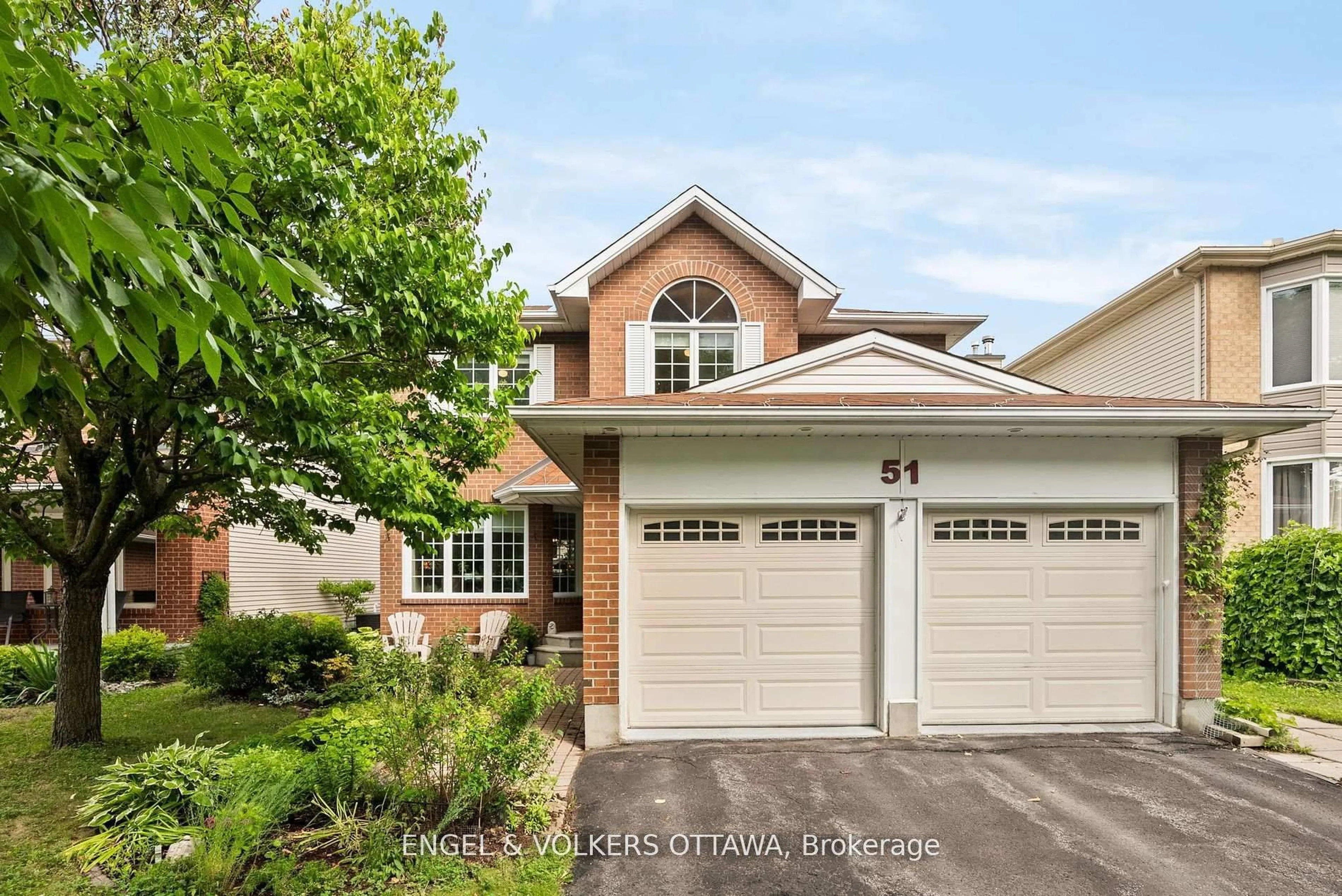Home with brick exterior material, street for 51 Emerald Meadows Dr, Ottawa Ontario K2M 2L5