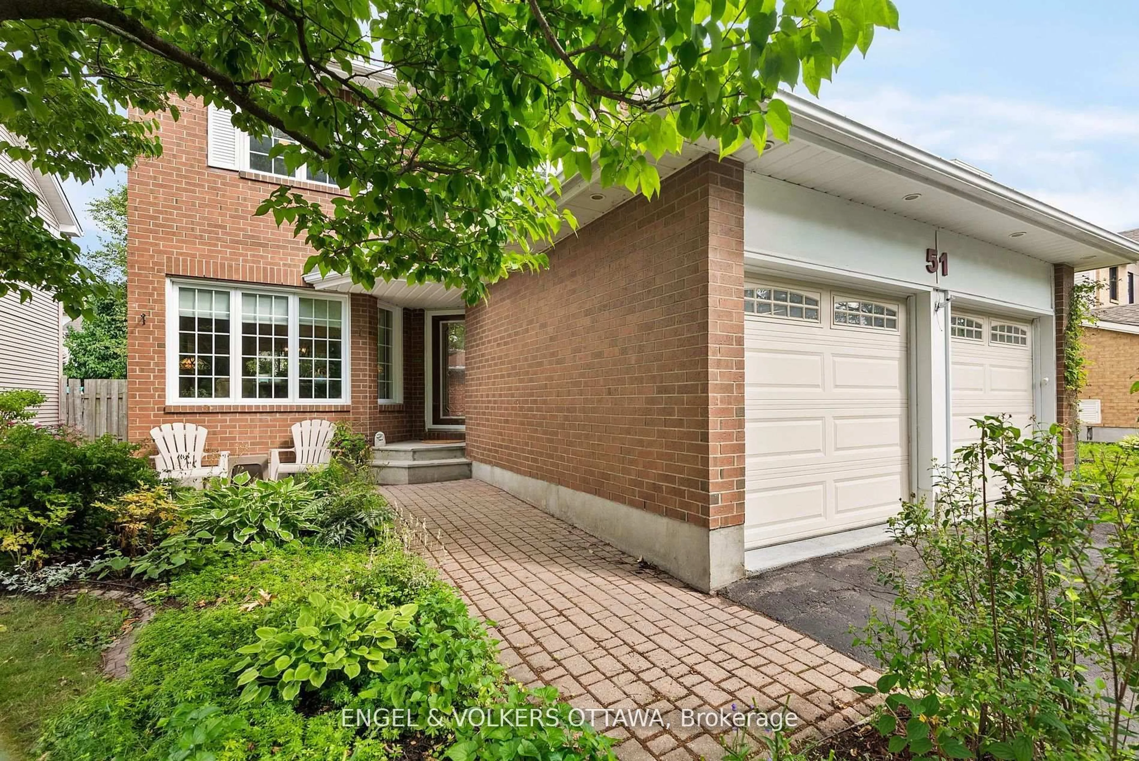 Home with brick exterior material, street for 51 Emerald Meadows Dr, Ottawa Ontario K2M 2L5