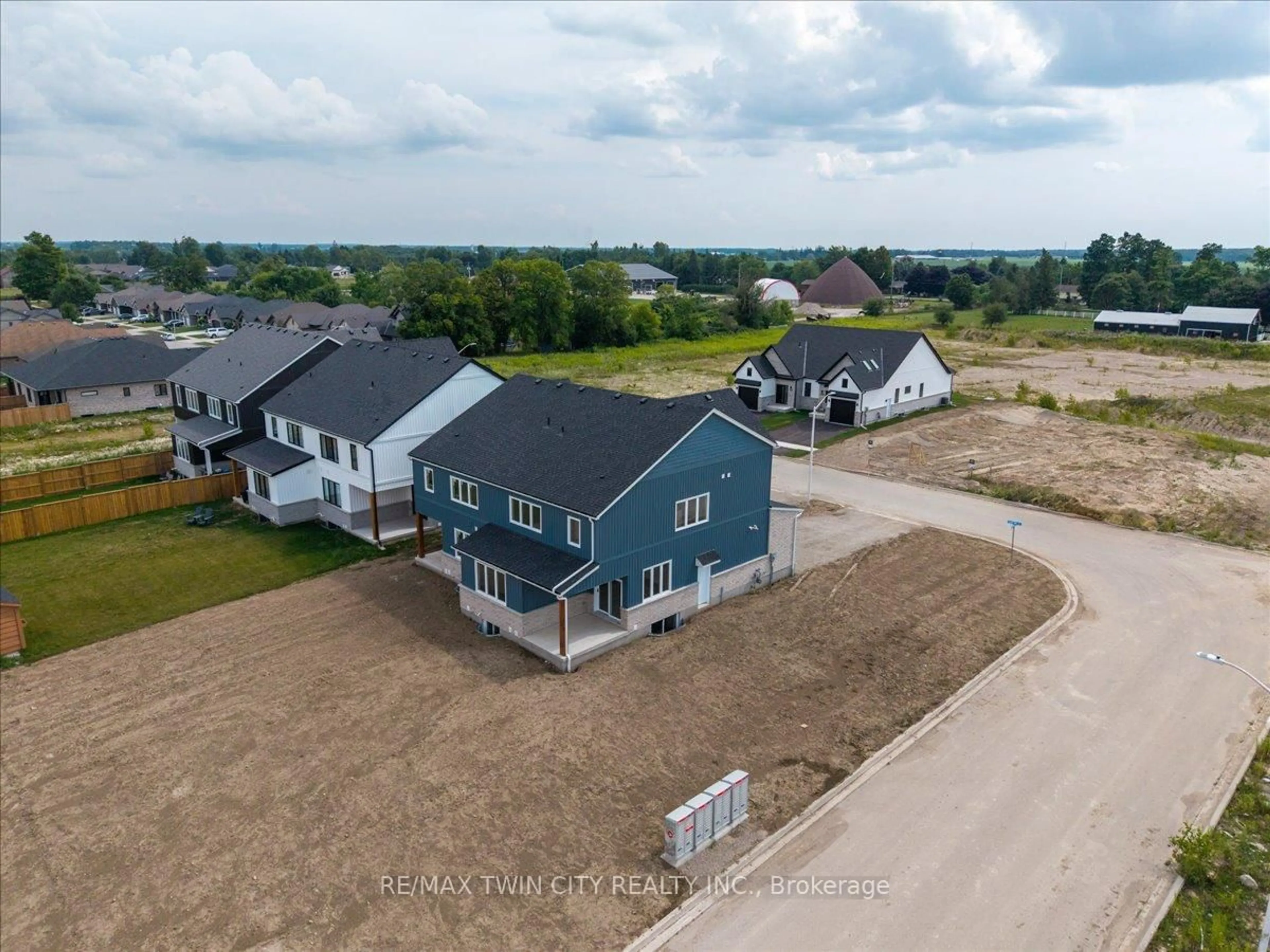 A pic from outside/outdoor area/front of a property/back of a property/a pic from drone, water/lake/river/ocean view for 103 Clayton St, West Perth Ontario N0K 1N0