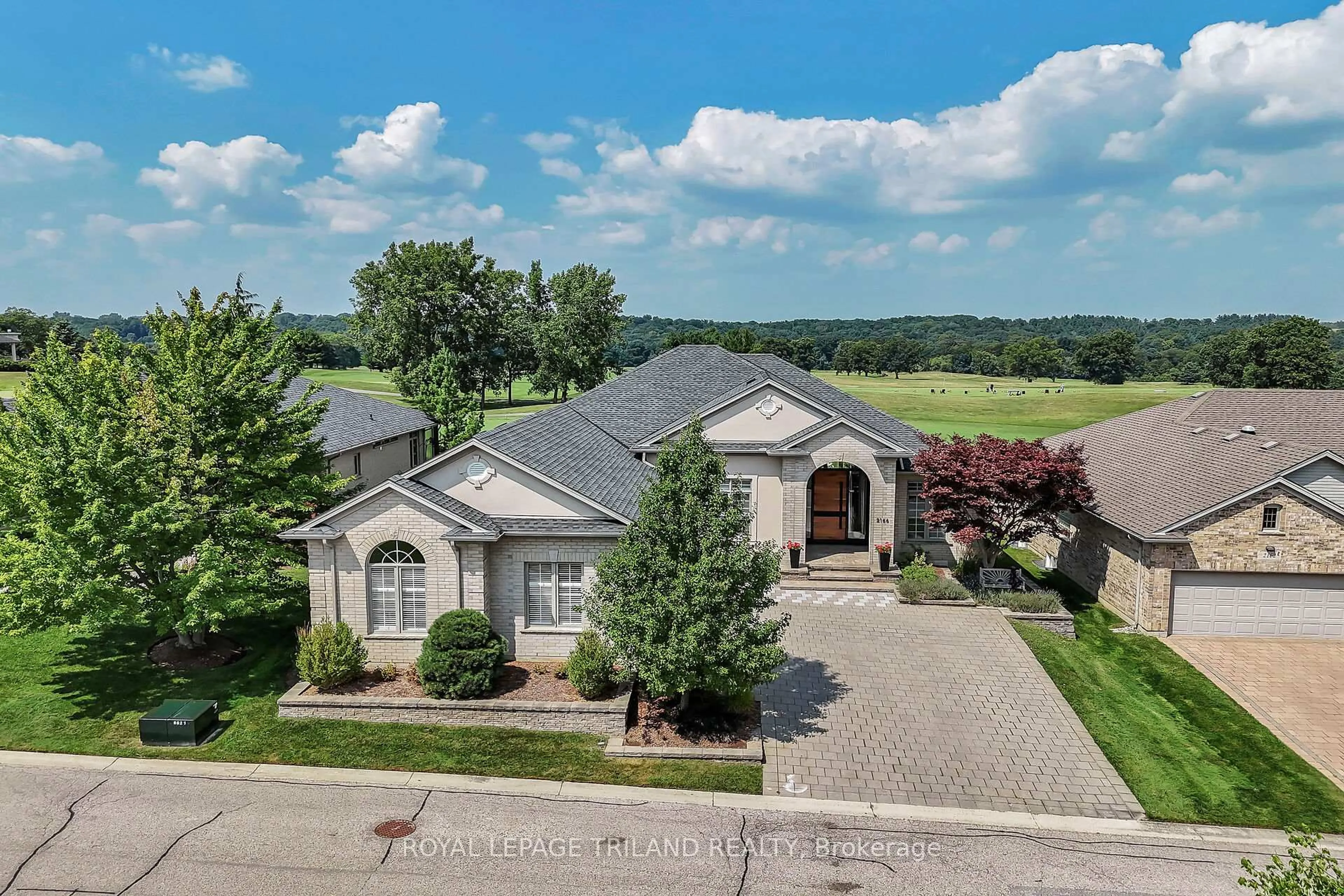 A pic from outside/outdoor area/front of a property/back of a property/a pic from drone, water/lake/river/ocean view for 2166 Jack Nash Dr, London South Ontario N6K 5R1