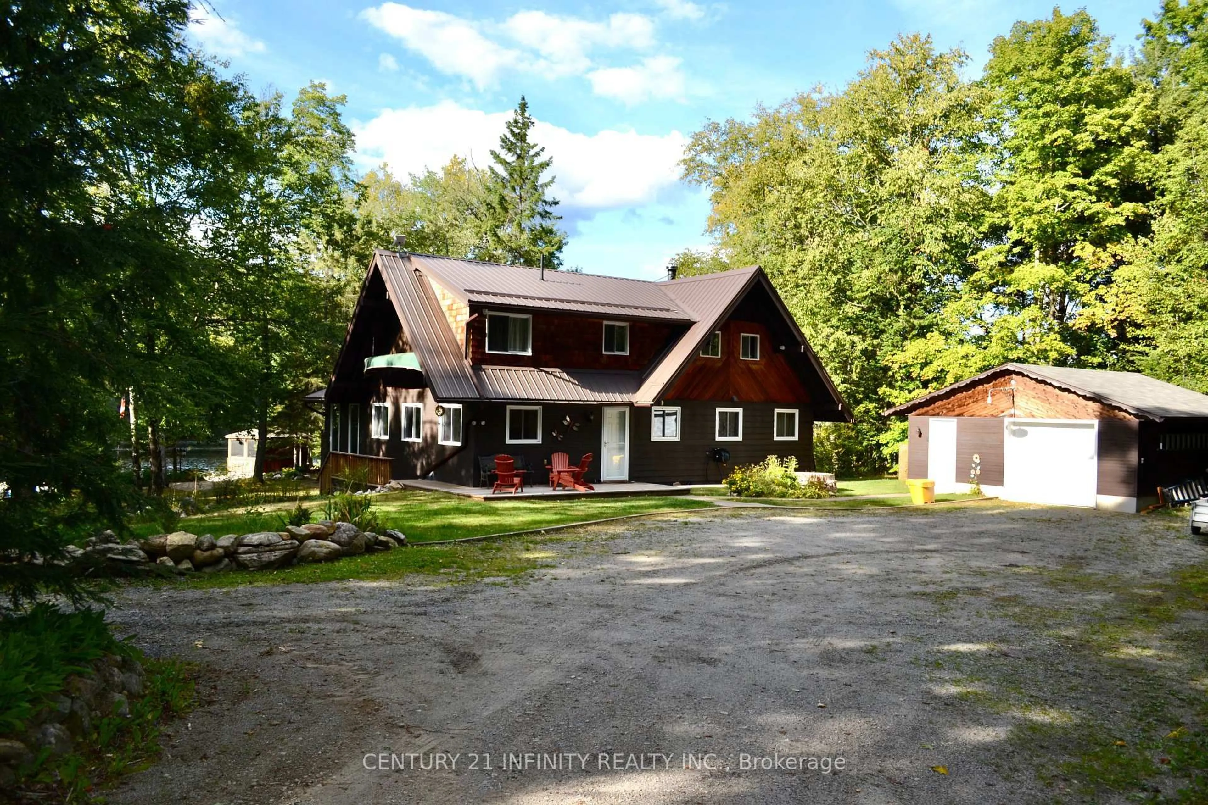 A pic from outside/outdoor area/front of a property/back of a property/a pic from drone, street for 1124 Dam Rd, Maynooth Ontario K0L 2K0