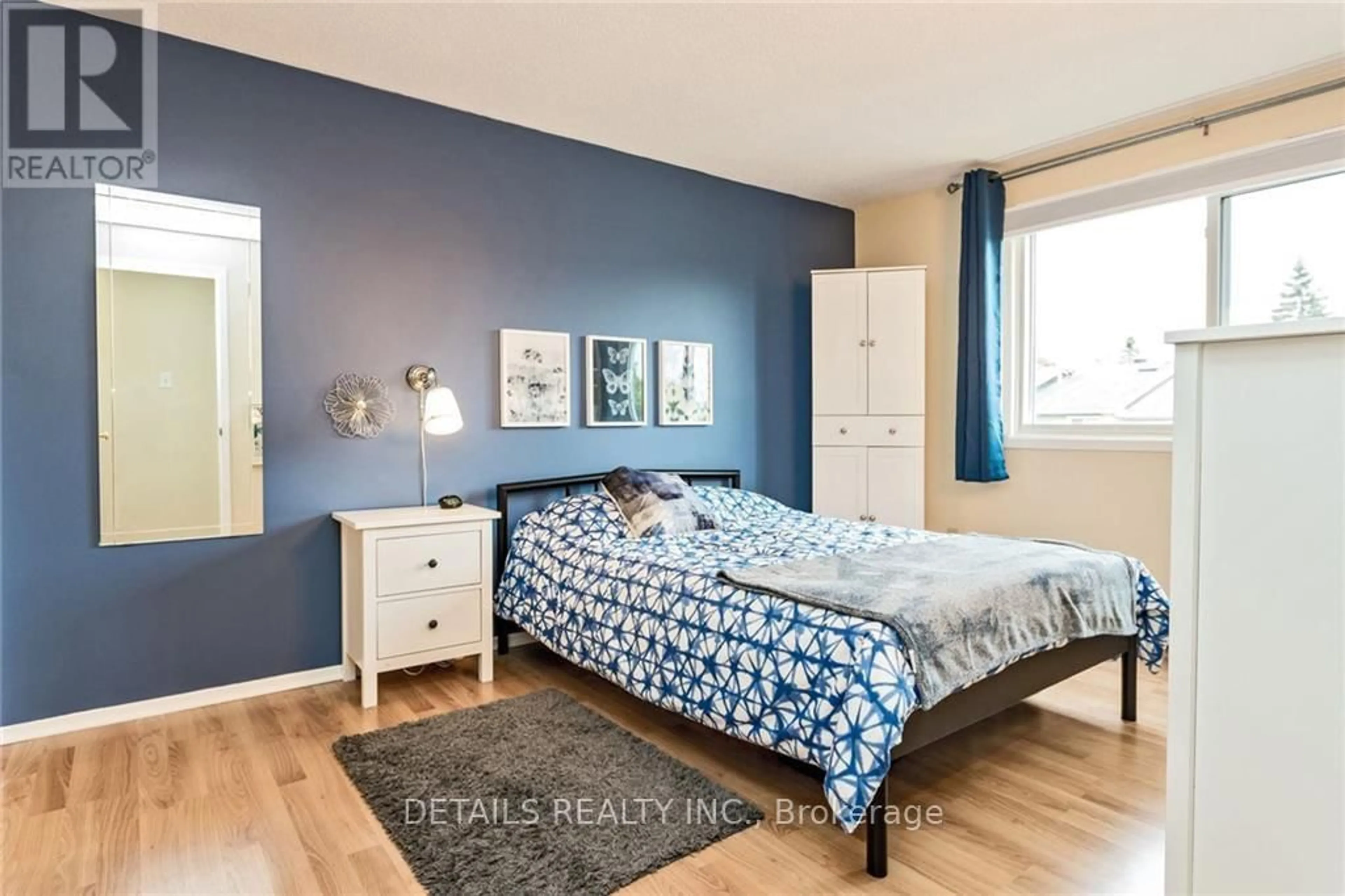 Bedroom with bed, wood/laminate floor for 6376 Bilberry Dr #304, Ottawa Ontario K1C 4P6