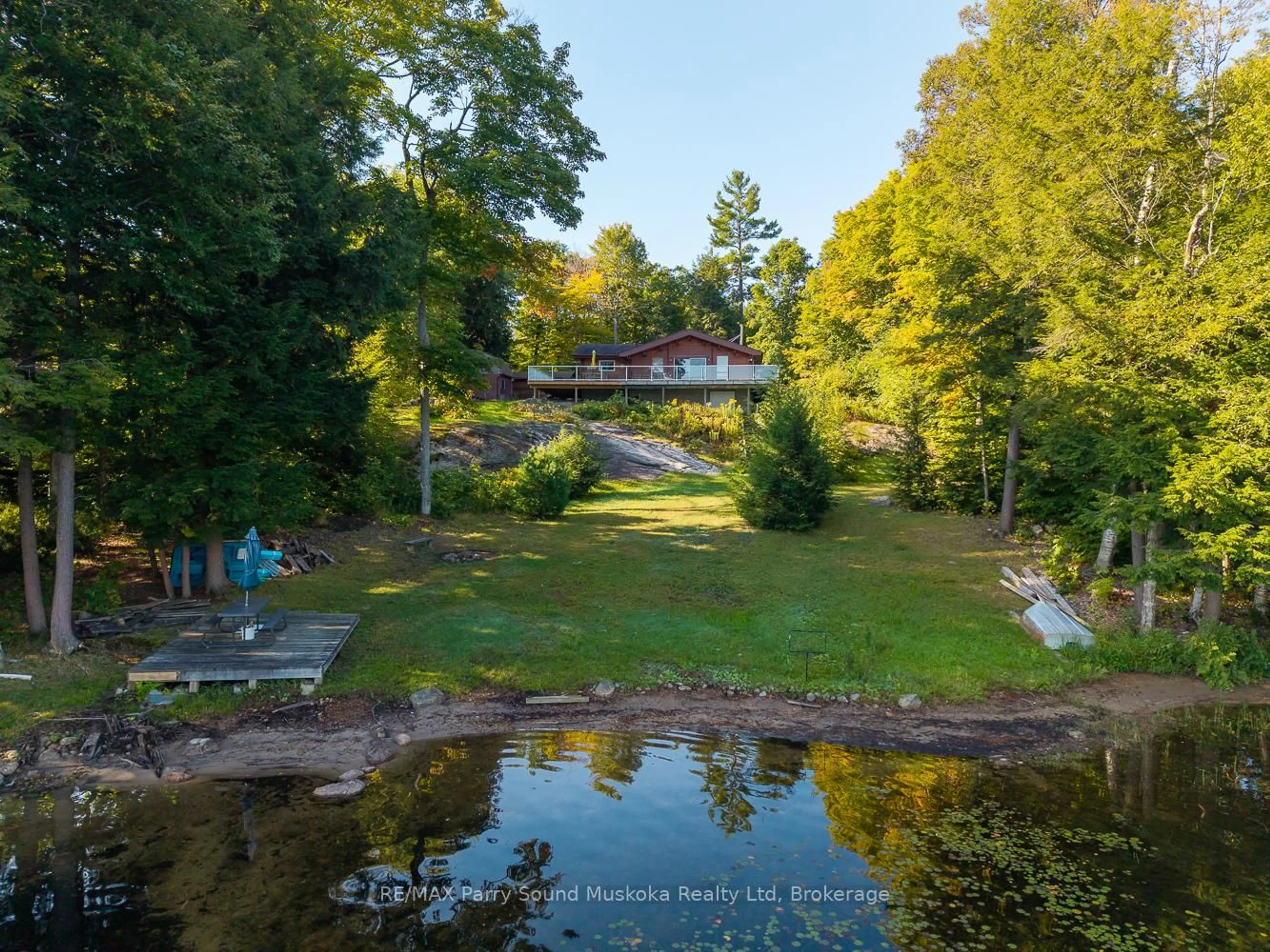 A pic from outside/outdoor area/front of a property/back of a property/a pic from drone, water/lake/river/ocean view for 30 Old Sids Rd, Seguin Ontario P2A 2W8