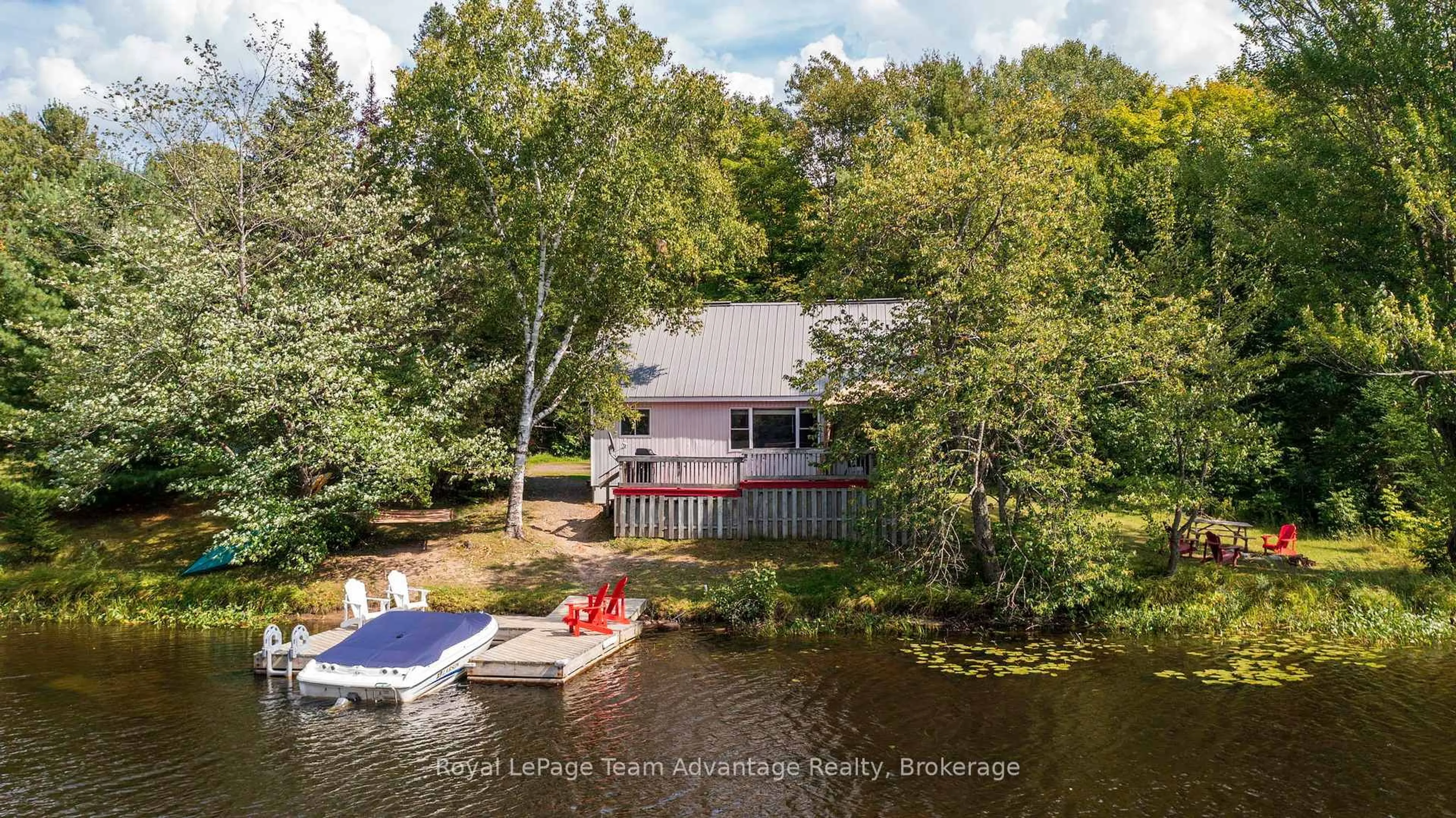 A pic from outside/outdoor area/front of a property/back of a property/a pic from drone, water/lake/river/ocean view for 79 Mckellar Lake Rd, McKellar Ontario P0G 1C0