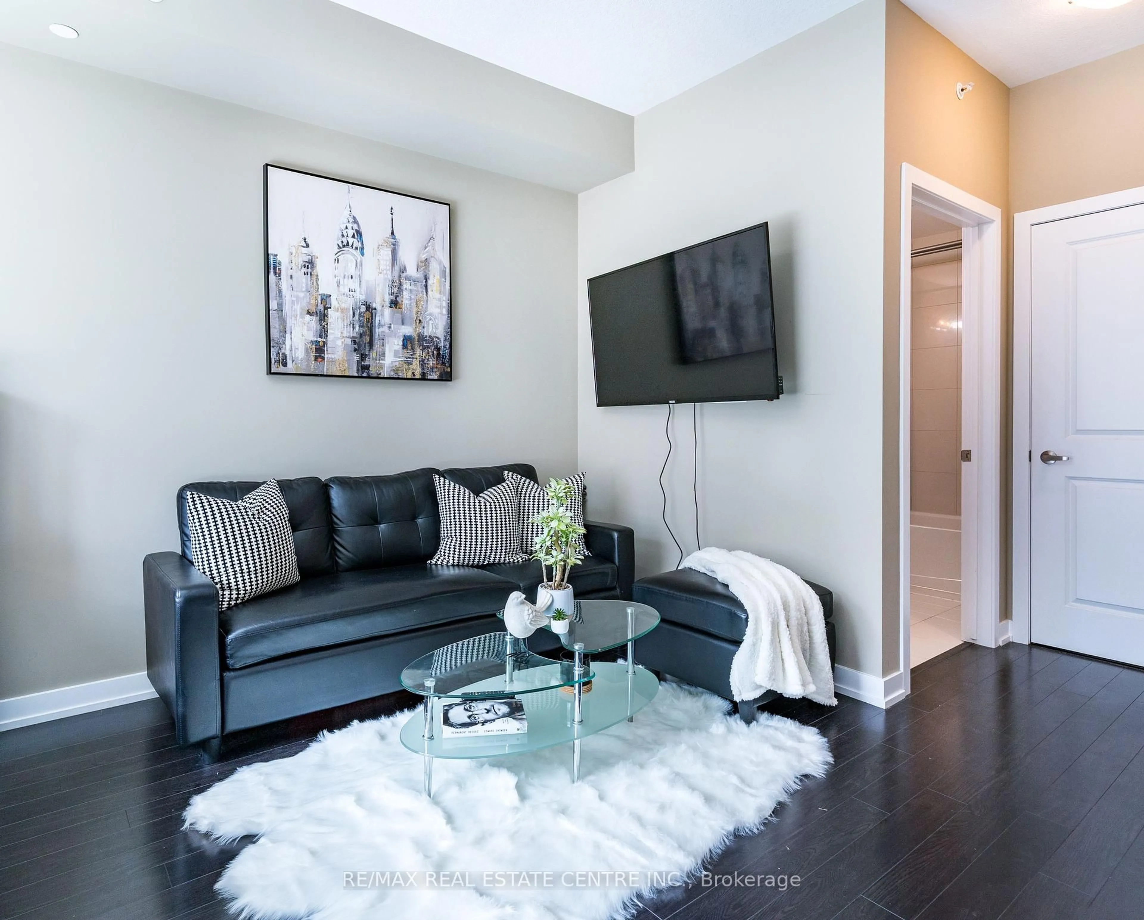 Living room with furniture, unknown for 35 Southshore Cres #114, Hamilton Ontario L8E 0J2