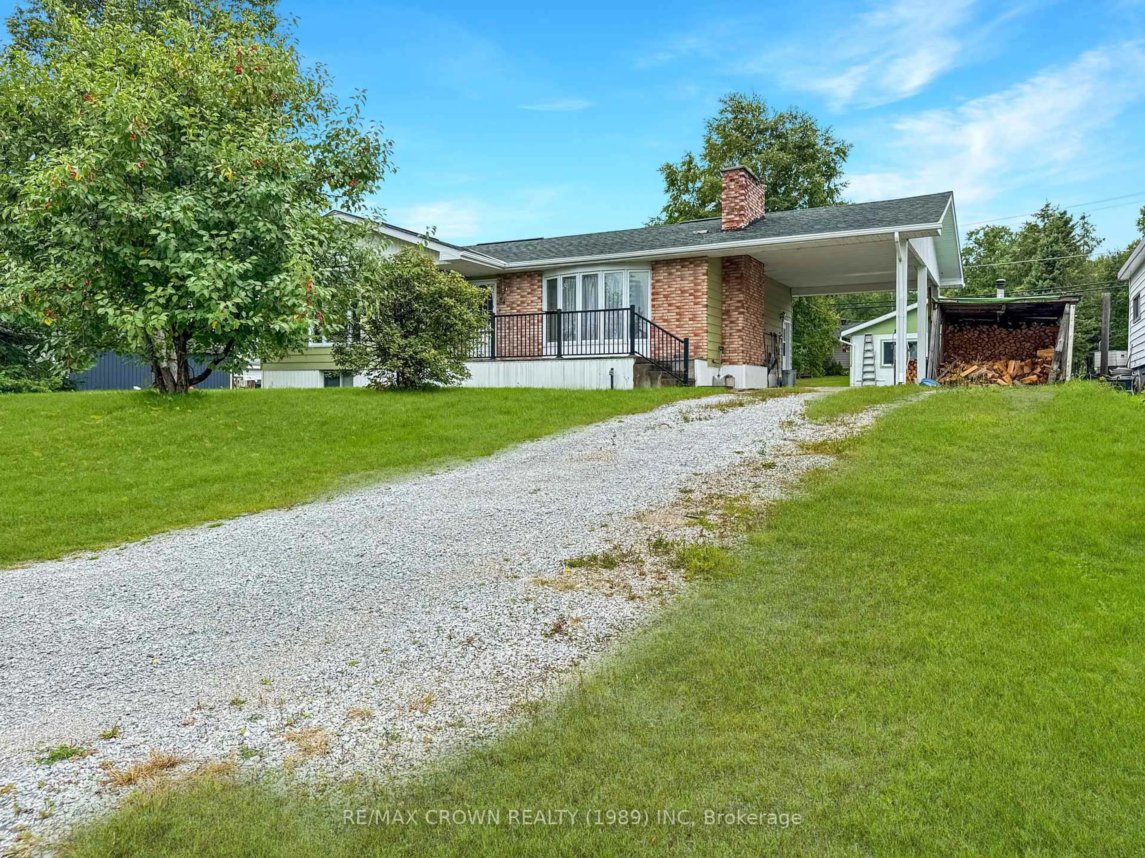 A pic from outside/outdoor area/front of a property/back of a property/a pic from drone, unknown for 84 Ecomadina Ave, Hornepayne Ontario P0M 1Z0