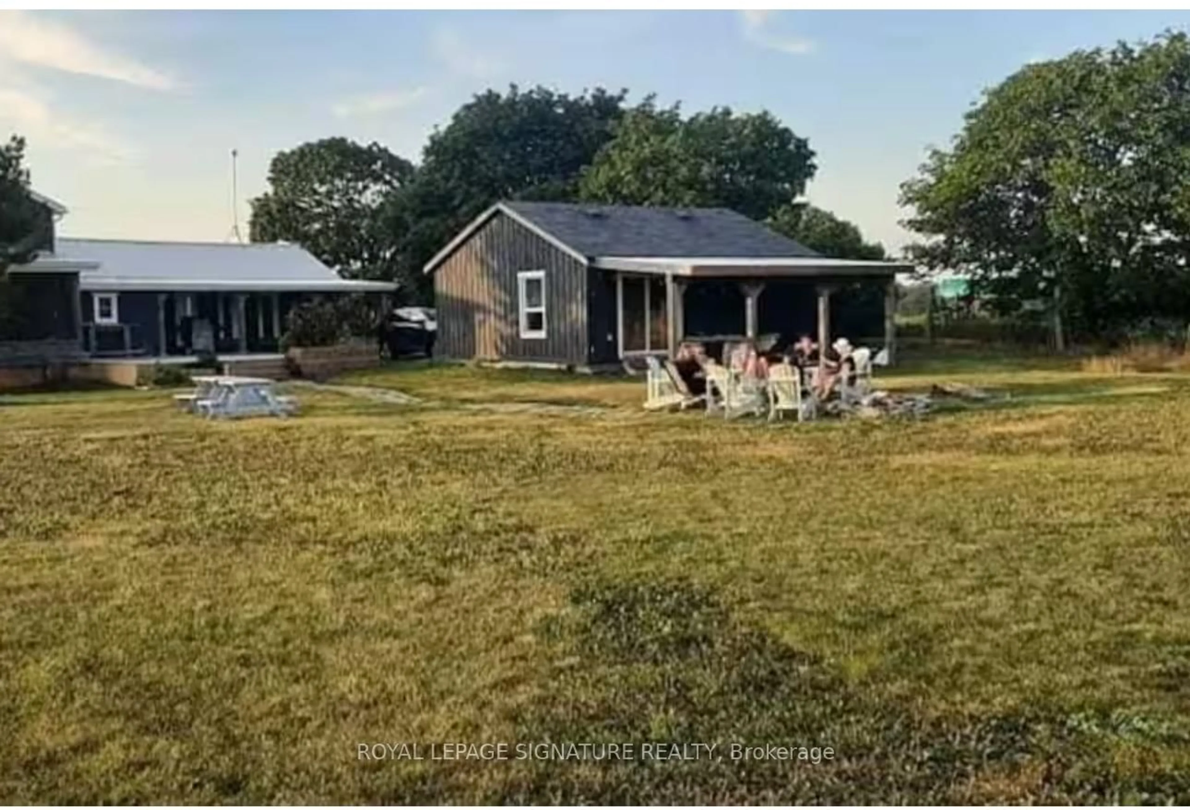 A pic from outside/outdoor area/front of a property/back of a property/a pic from drone, street for 217 Greer Rd, Prince Edward County Ontario K0K 3L0