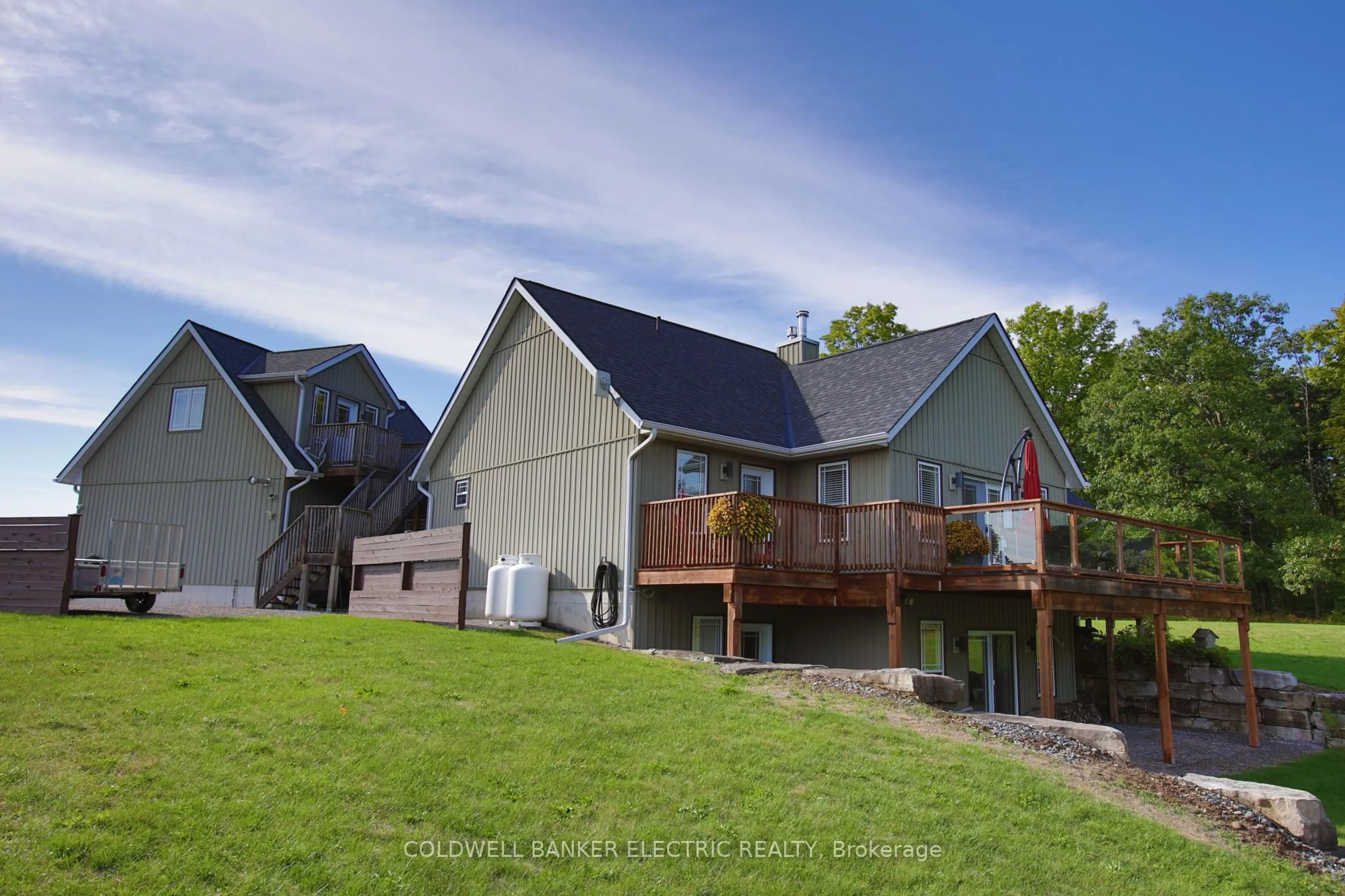 A pic from outside/outdoor area/front of a property/back of a property/a pic from drone, mountain view for 6005 County Road 25, Trent Hills Ontario L7J 2L7