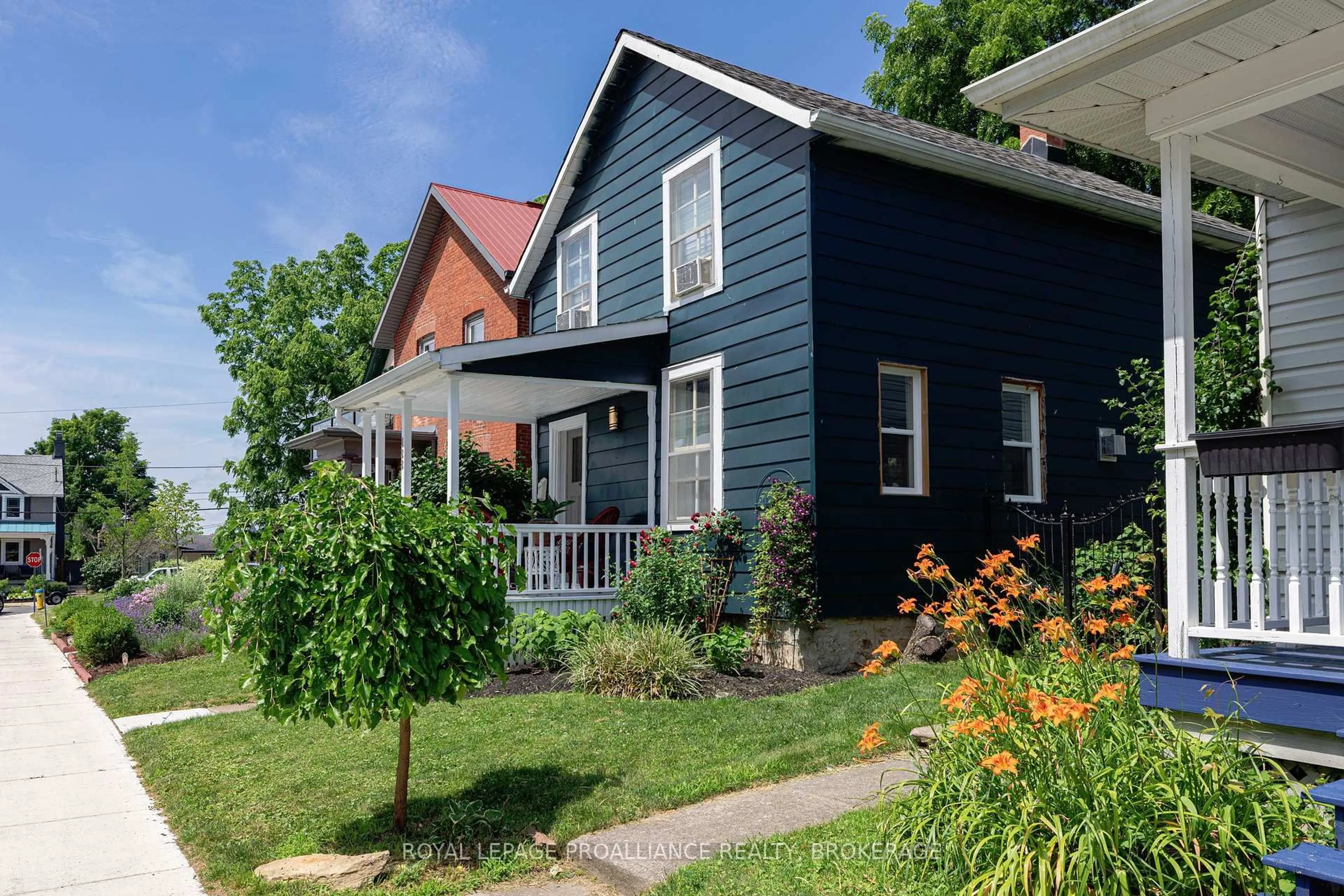 Home with vinyl exterior material, street for 122 South St, Gananoque Ontario K7G 1A2