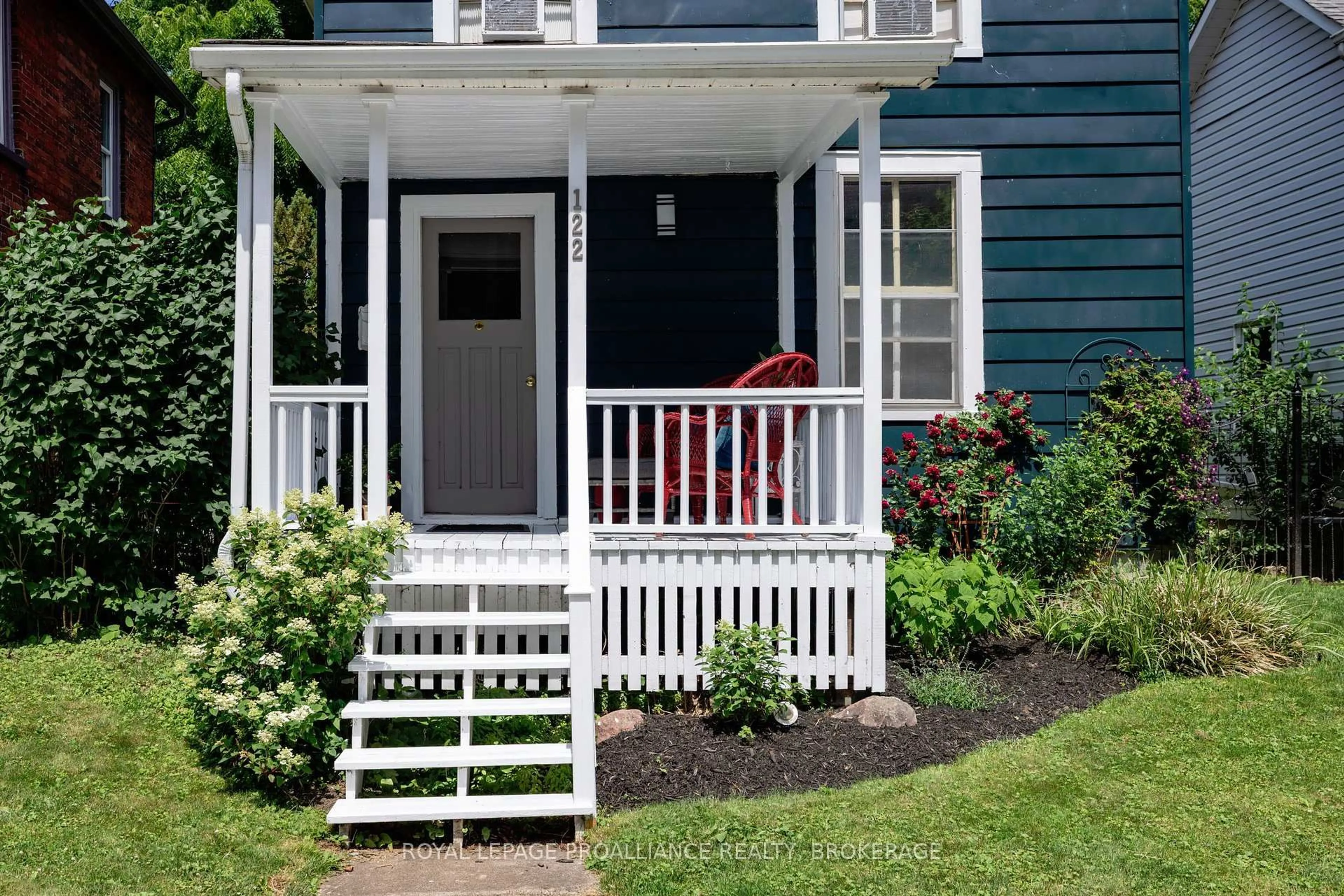Home with vinyl exterior material, street for 122 South St, Gananoque Ontario K7G 1A2