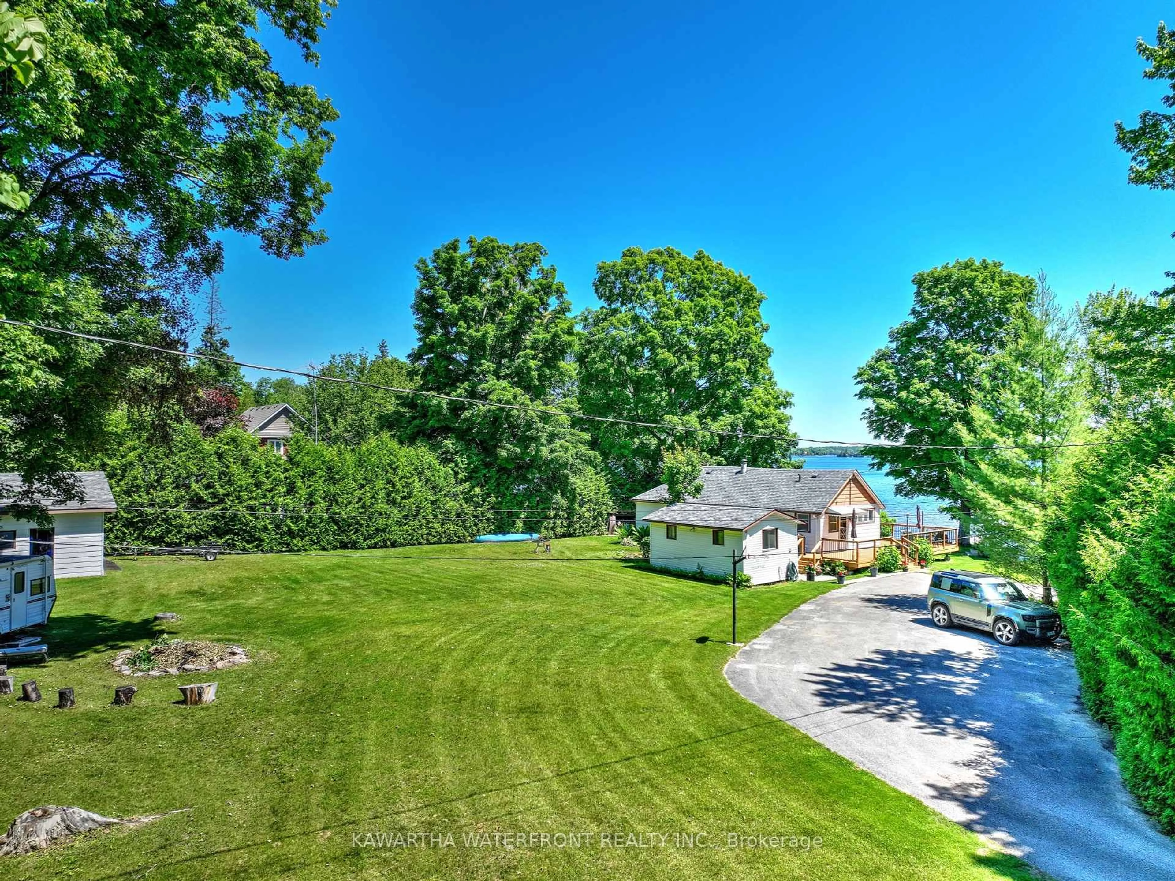 A pic from outside/outdoor area/front of a property/back of a property/a pic from drone, water/lake/river/ocean view for 210 Wrenhaven Rd, Kawartha Lakes Ontario K0M 1N0