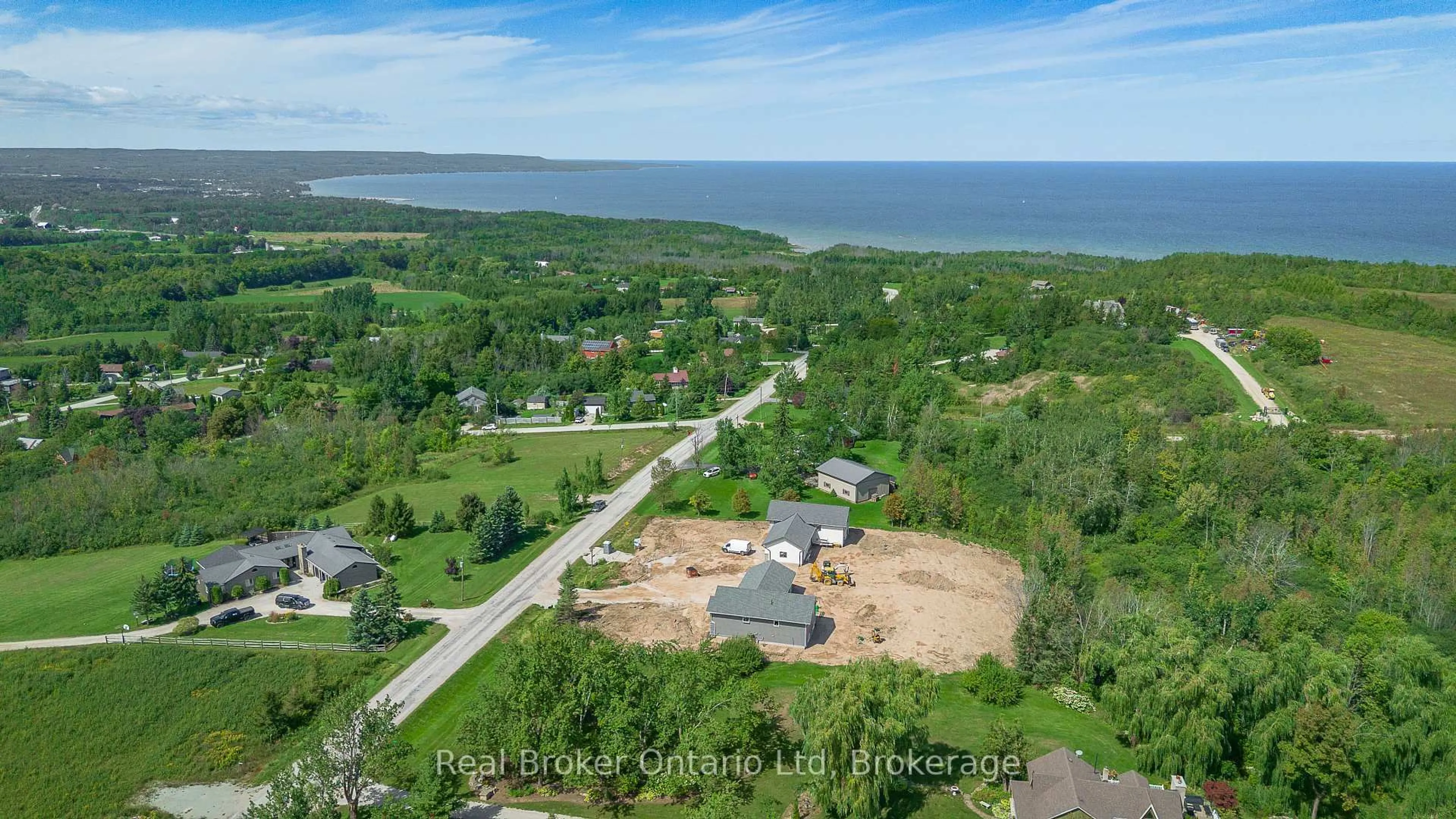 A pic from outside/outdoor area/front of a property/back of a property/a pic from drone, water/lake/river/ocean view for 317557 3rd Line, Meaford Ontario N4L 1W7
