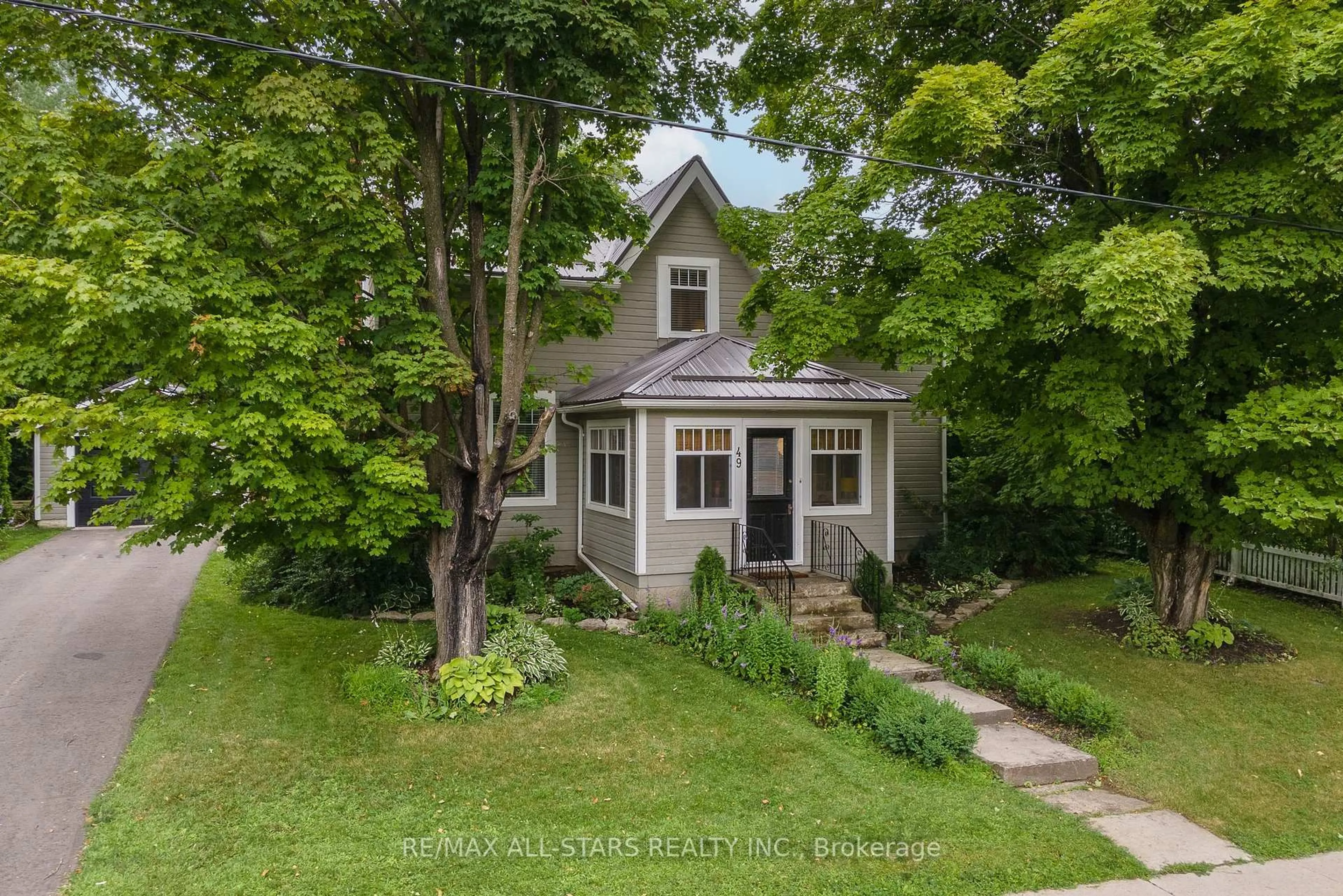 A pic from outside/outdoor area/front of a property/back of a property/a pic from drone, street for 49 John St, Kawartha Lakes Ontario K0M 1N0