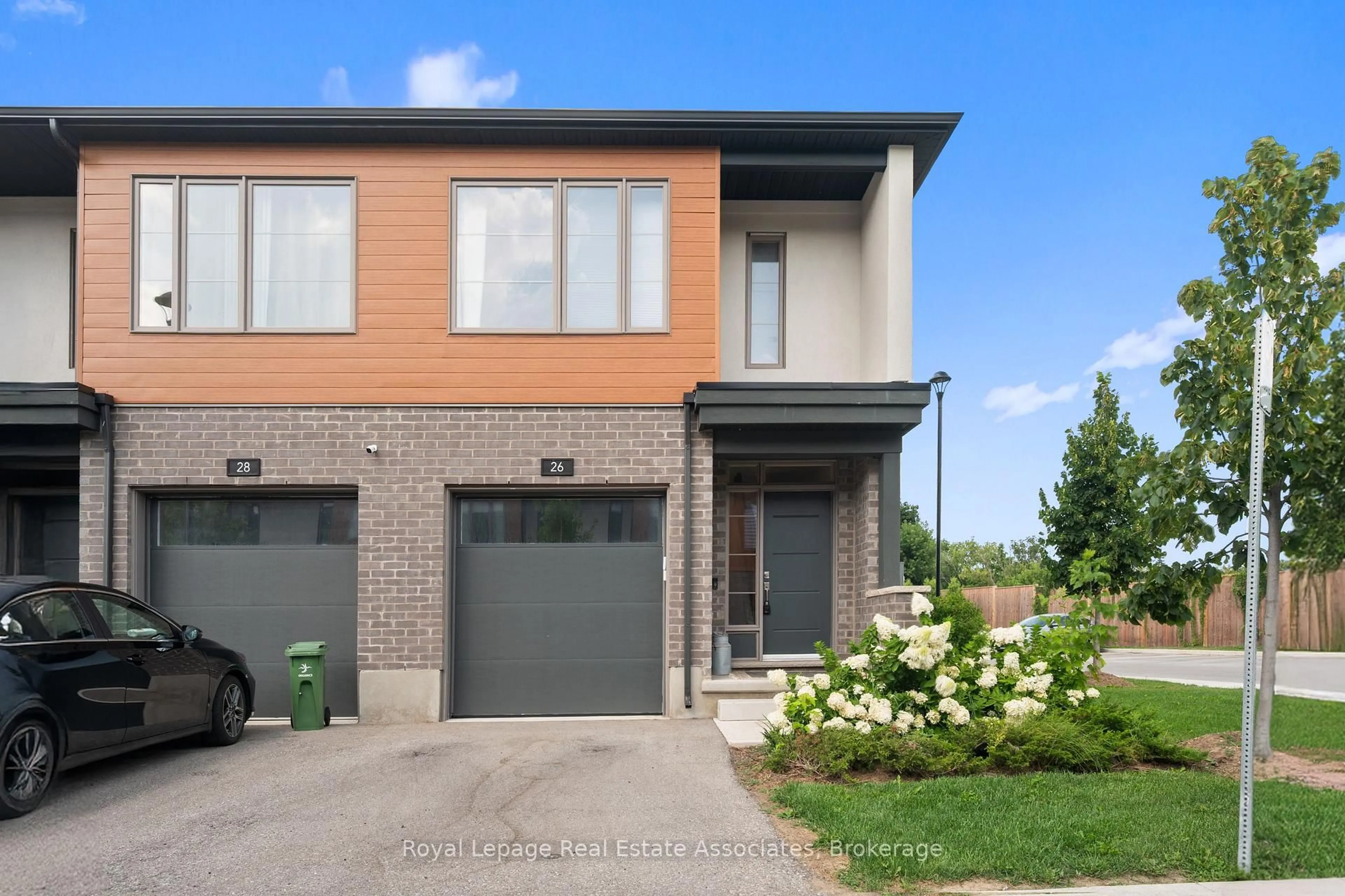 Home with brick exterior material, street for 26 Steele Cres, Guelph Ontario N1E 0S7