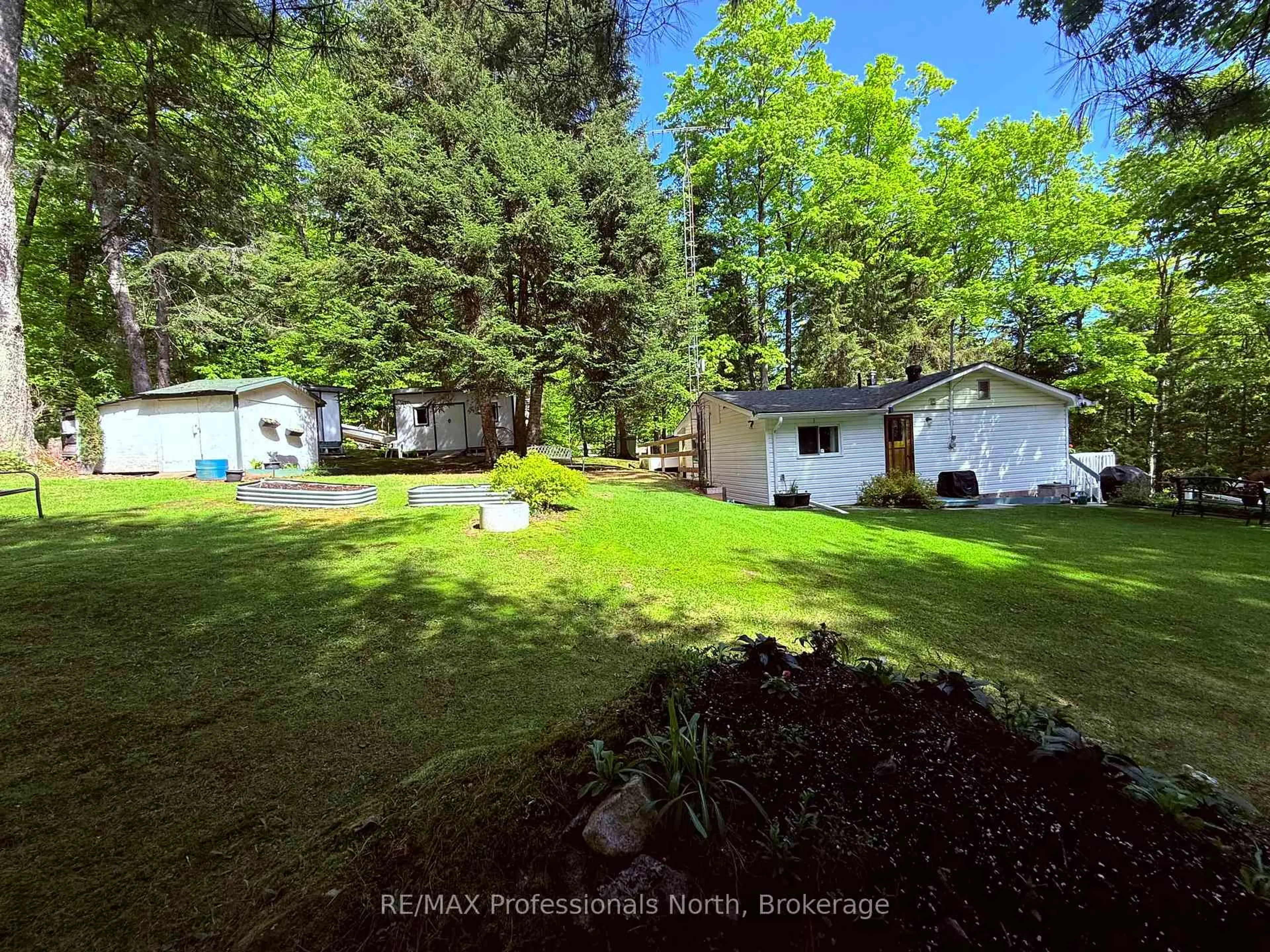 A pic from outside/outdoor area/front of a property/back of a property/a pic from drone, unknown for 1039 Grace River Rd, Highlands East Ontario K0L 3C0
