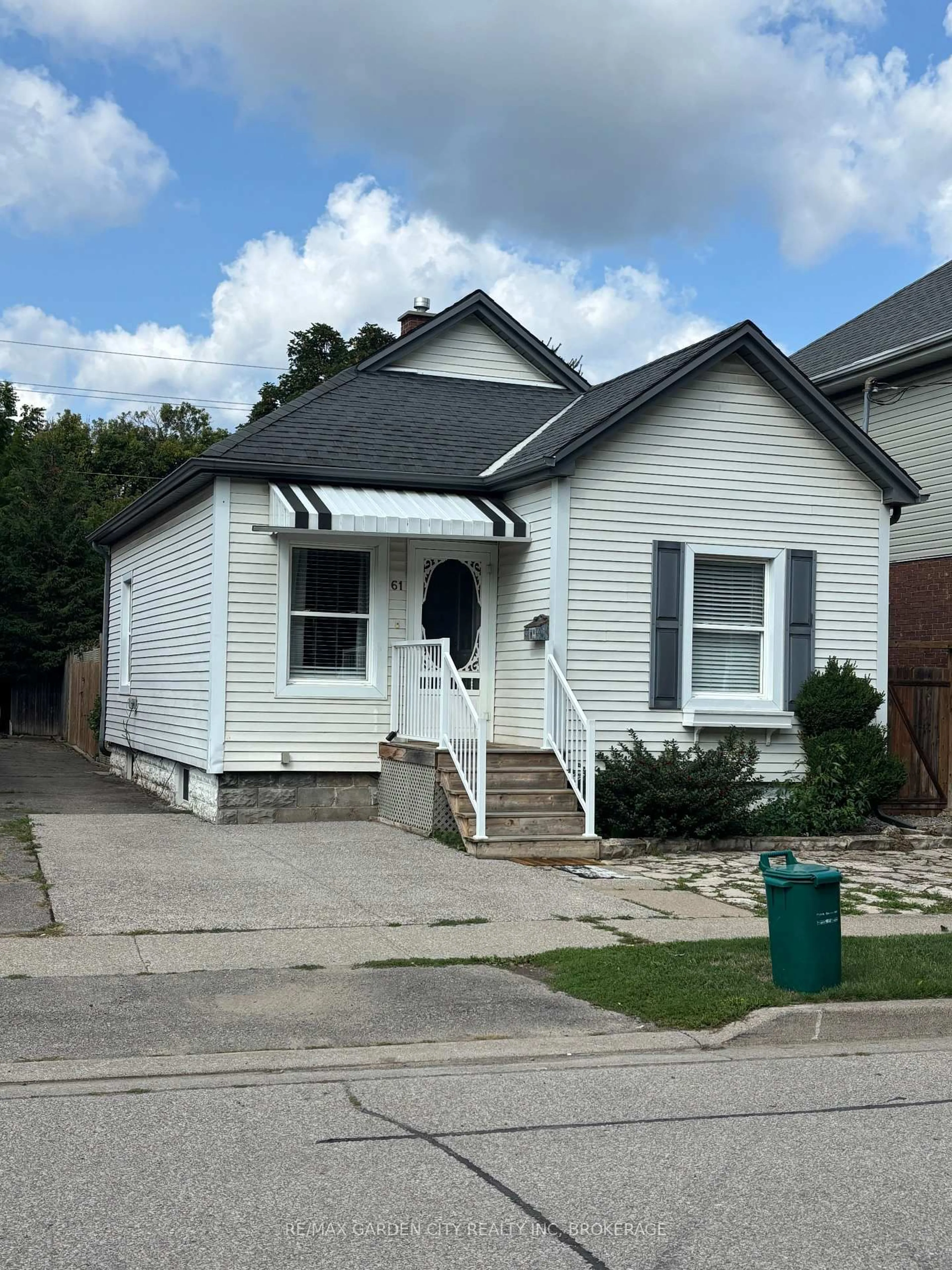 Home with vinyl exterior material, street for 61 Rodman St, St. Catharines Ontario L2R 5C9