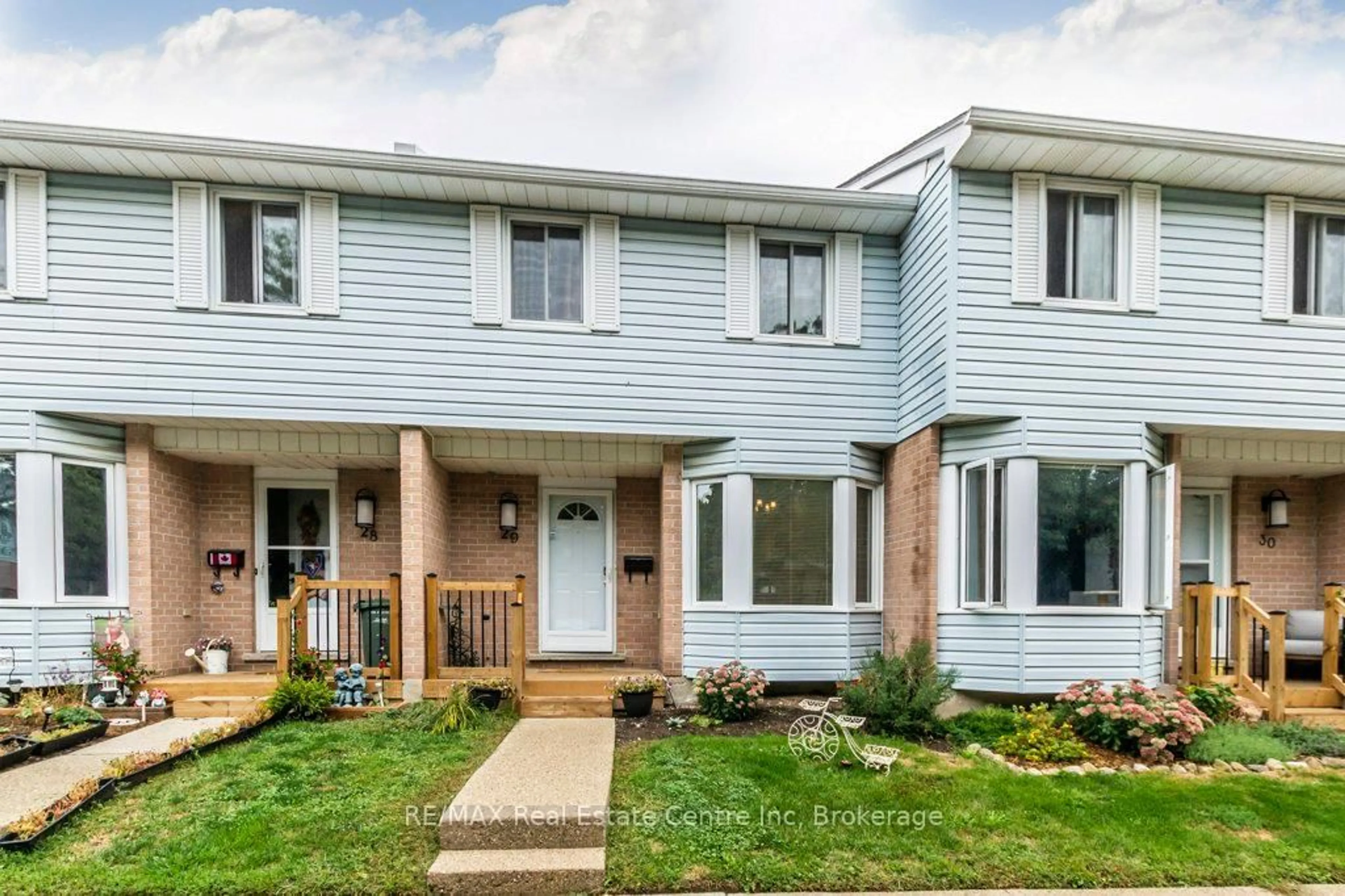 Home with vinyl exterior material, street for 80 Ferman Dr #29, Guelph Ontario N1H 8B3