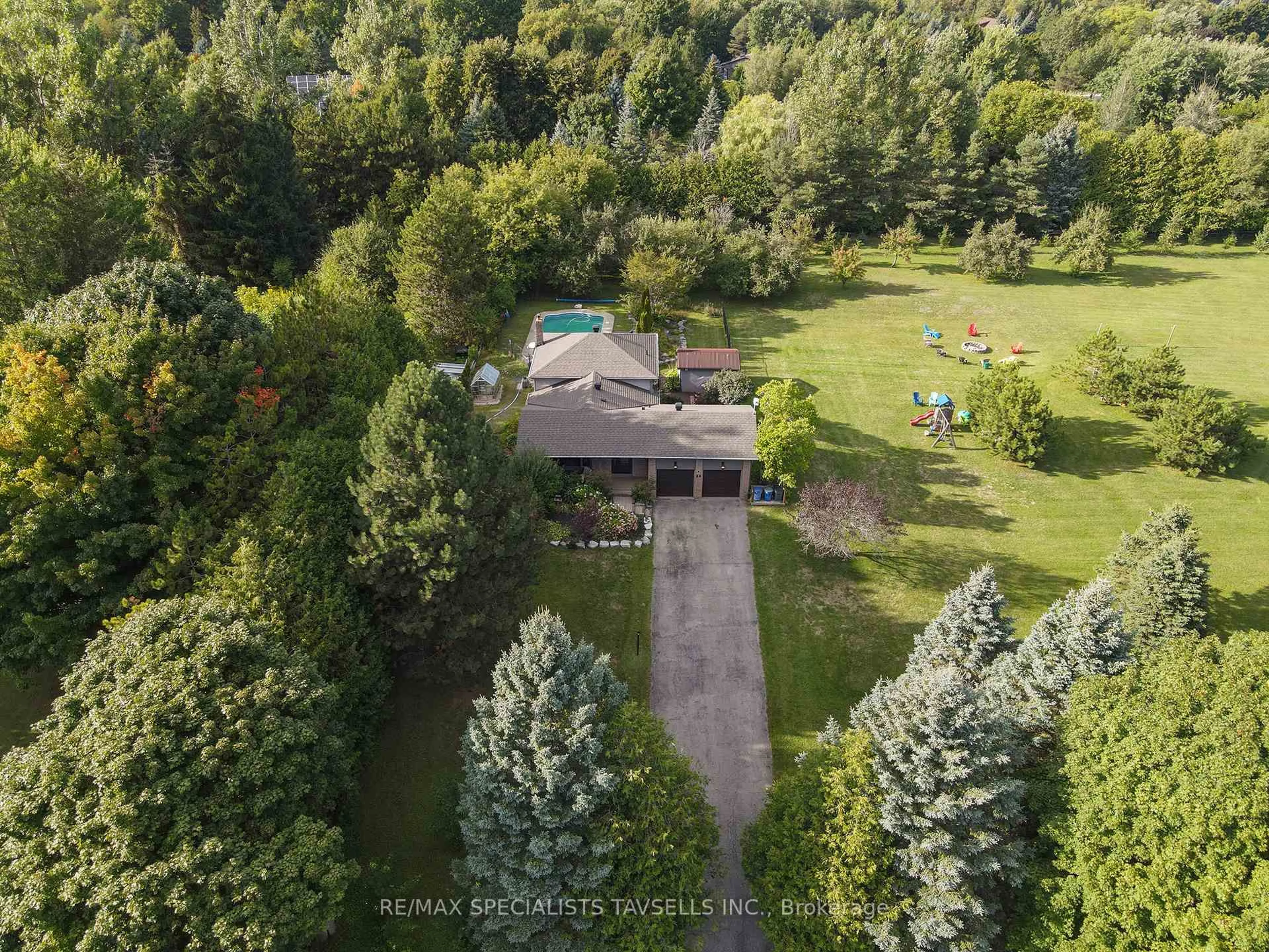A pic from outside/outdoor area/front of a property/back of a property/a pic from drone, forest/trees view for 23 Mckibbon Ave, Amaranth Ontario L9W 5M2