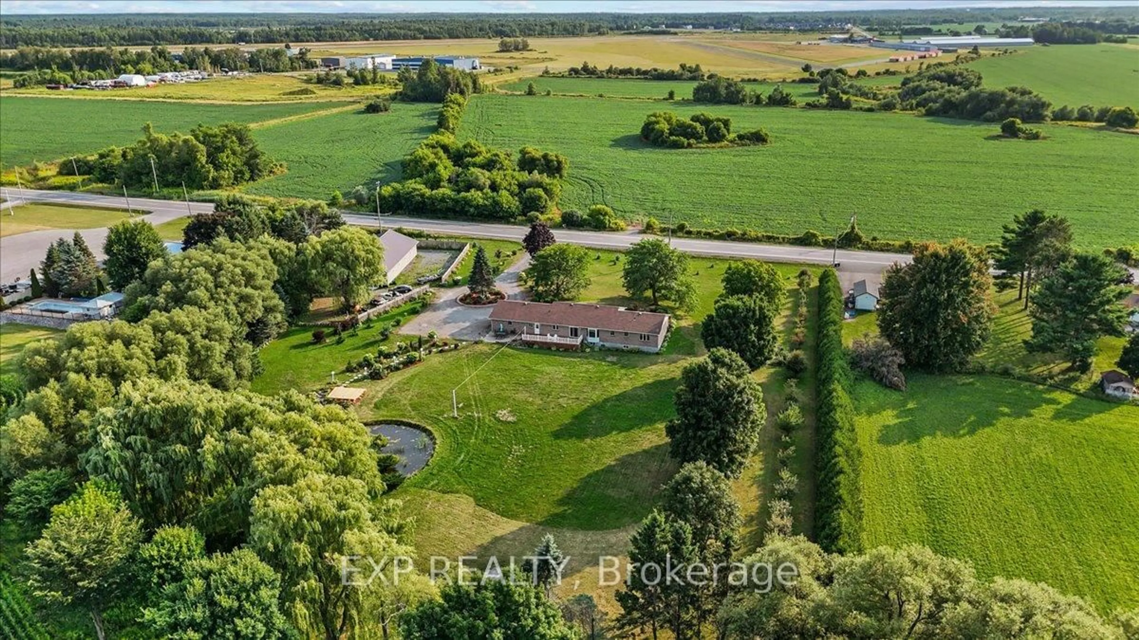 A pic from outside/outdoor area/front of a property/back of a property/a pic from drone, water/lake/river/ocean view for 3382 Carp Rd, Carp Ontario K0A 1L0