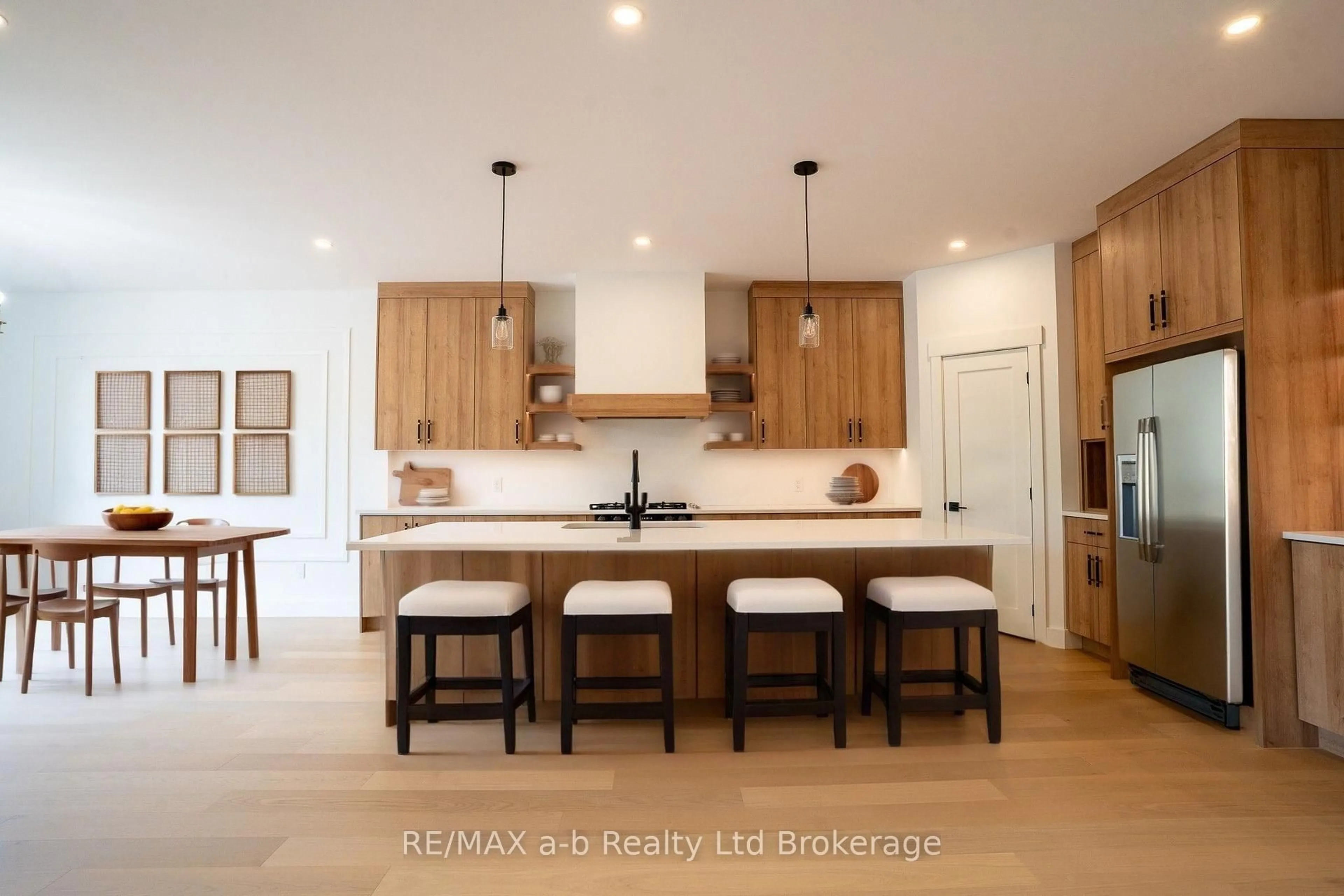 Open concept kitchen, wood/laminate floor for 88 Herb St, Norwich Ontario N0J 1P0