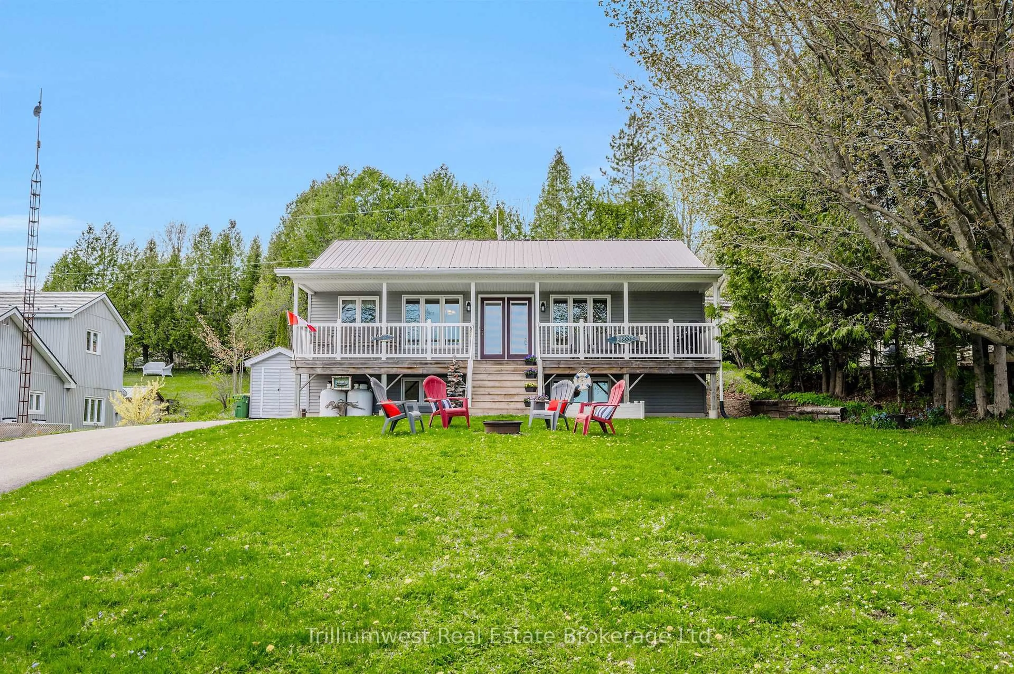 A pic from outside/outdoor area/front of a property/back of a property/a pic from drone, water/lake/river/ocean view for 133596 Wilcox Lake Rd, Grey Highlands Ontario N0C 1E0
