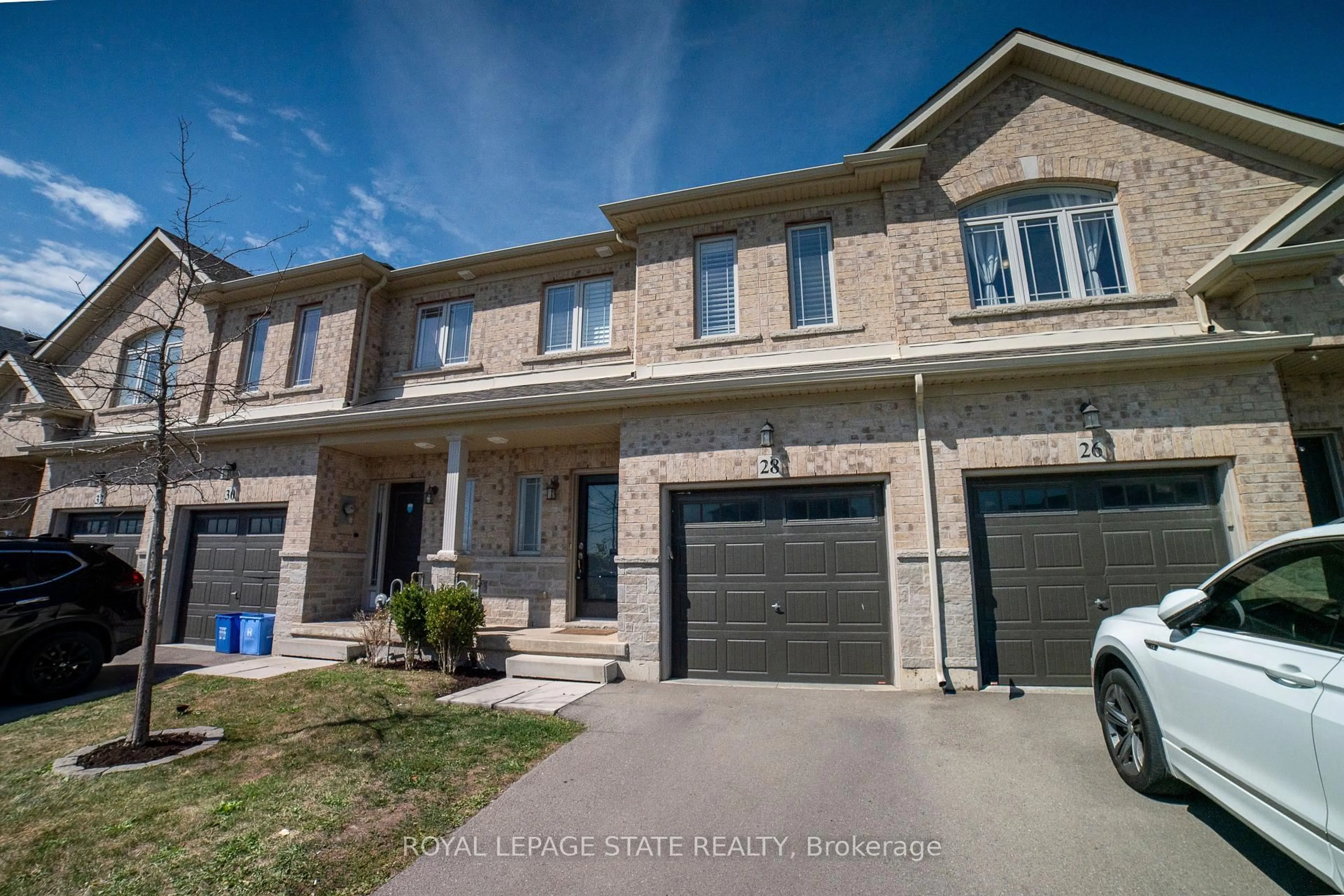 Home with brick exterior material, street for 28 Kingsborough Dr, Hamilton Ontario L0R 1P0
