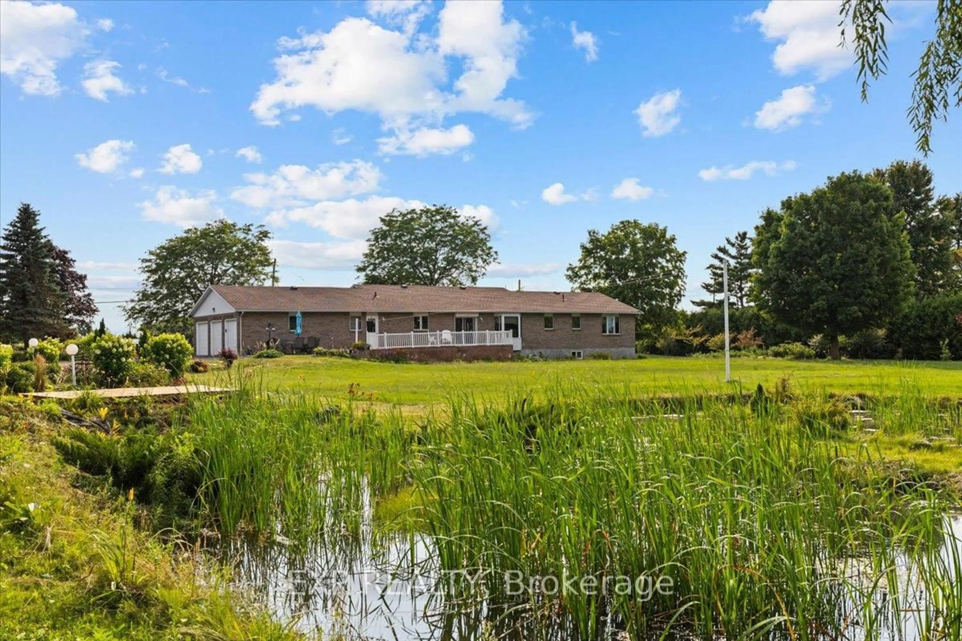 A pic from outside/outdoor area/front of a property/back of a property/a pic from drone, water/lake/river/ocean view for 3382 Carp Rd, Carp Ontario K0A 1L0