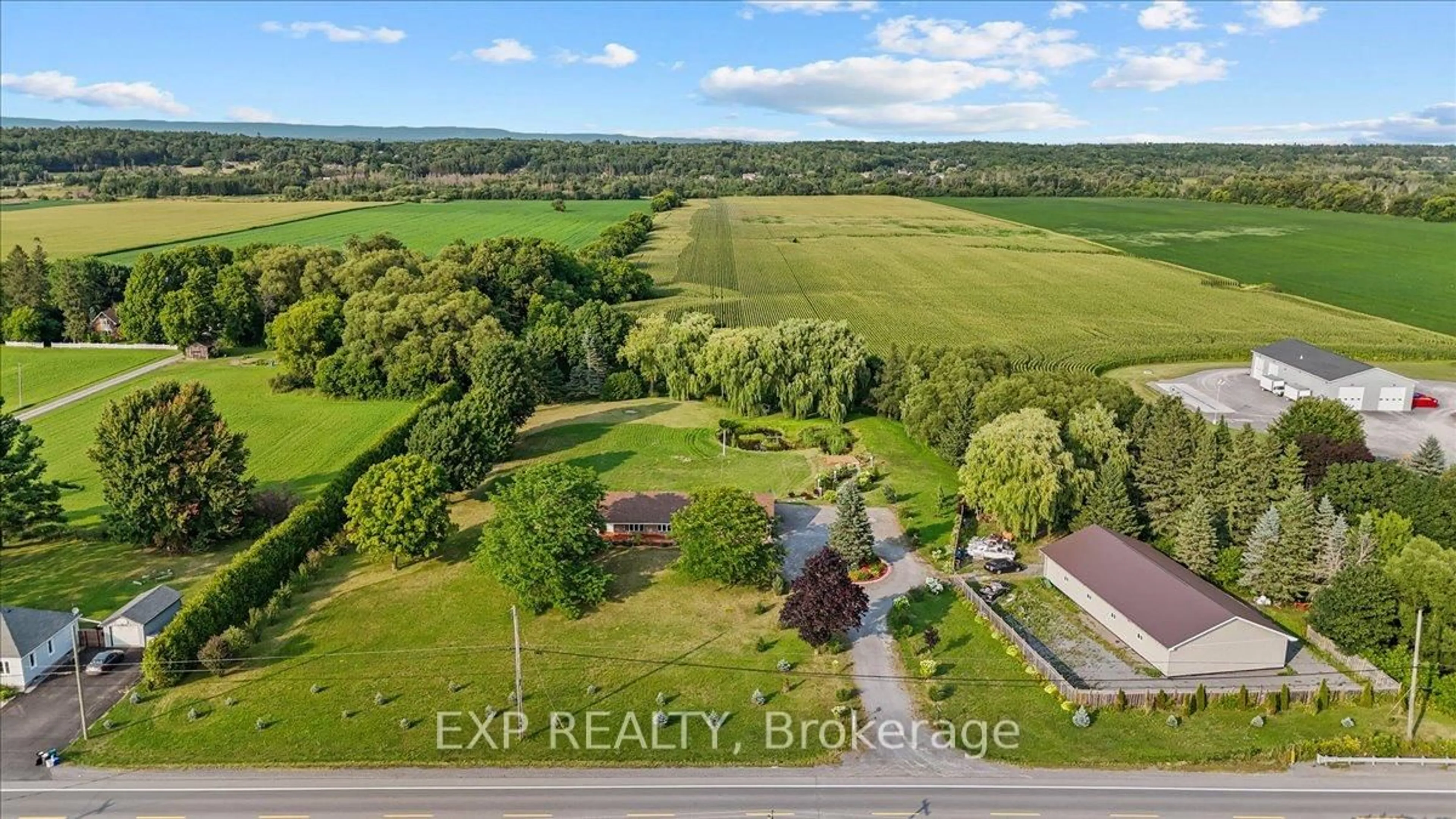 A pic from outside/outdoor area/front of a property/back of a property/a pic from drone, water/lake/river/ocean view for 3382 Carp Rd, Carp Ontario K0A 1L0