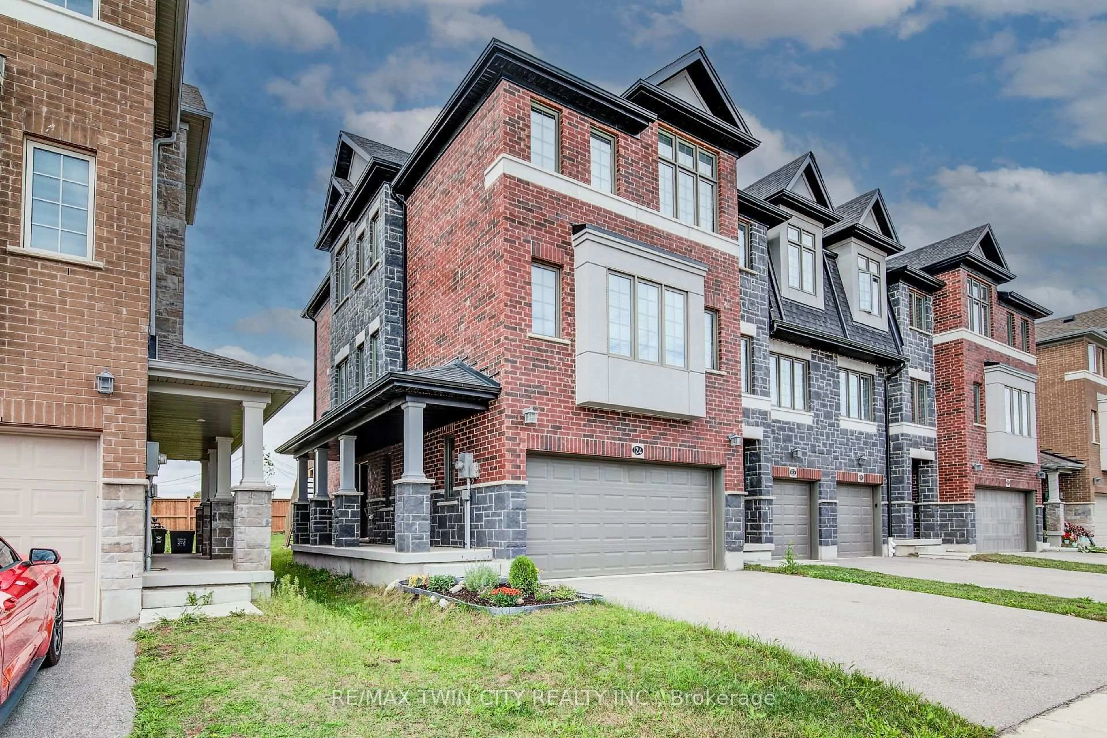 Home with brick exterior material, street for 124 Ian Ormston Dr, Kitchener Ontario N2P 2Y8