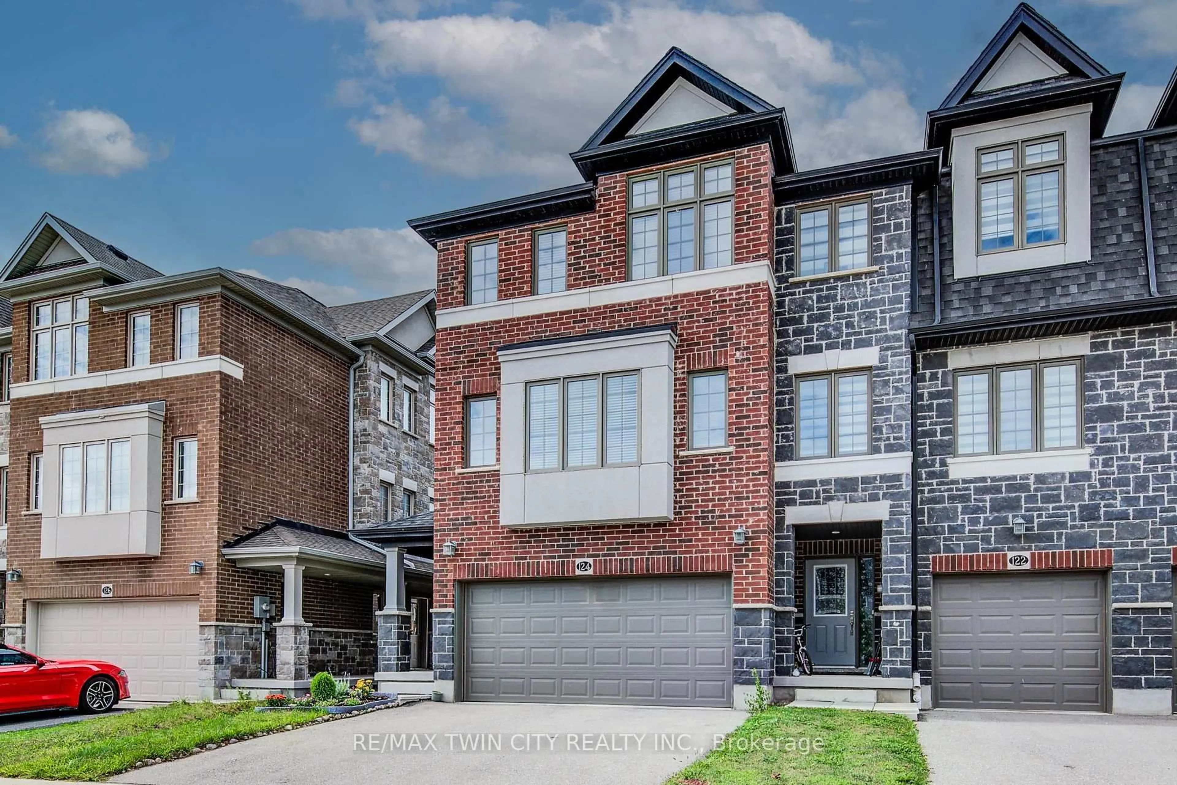 Home with brick exterior material, street for 124 Ian Ormston Dr, Kitchener Ontario N2P 2Y8
