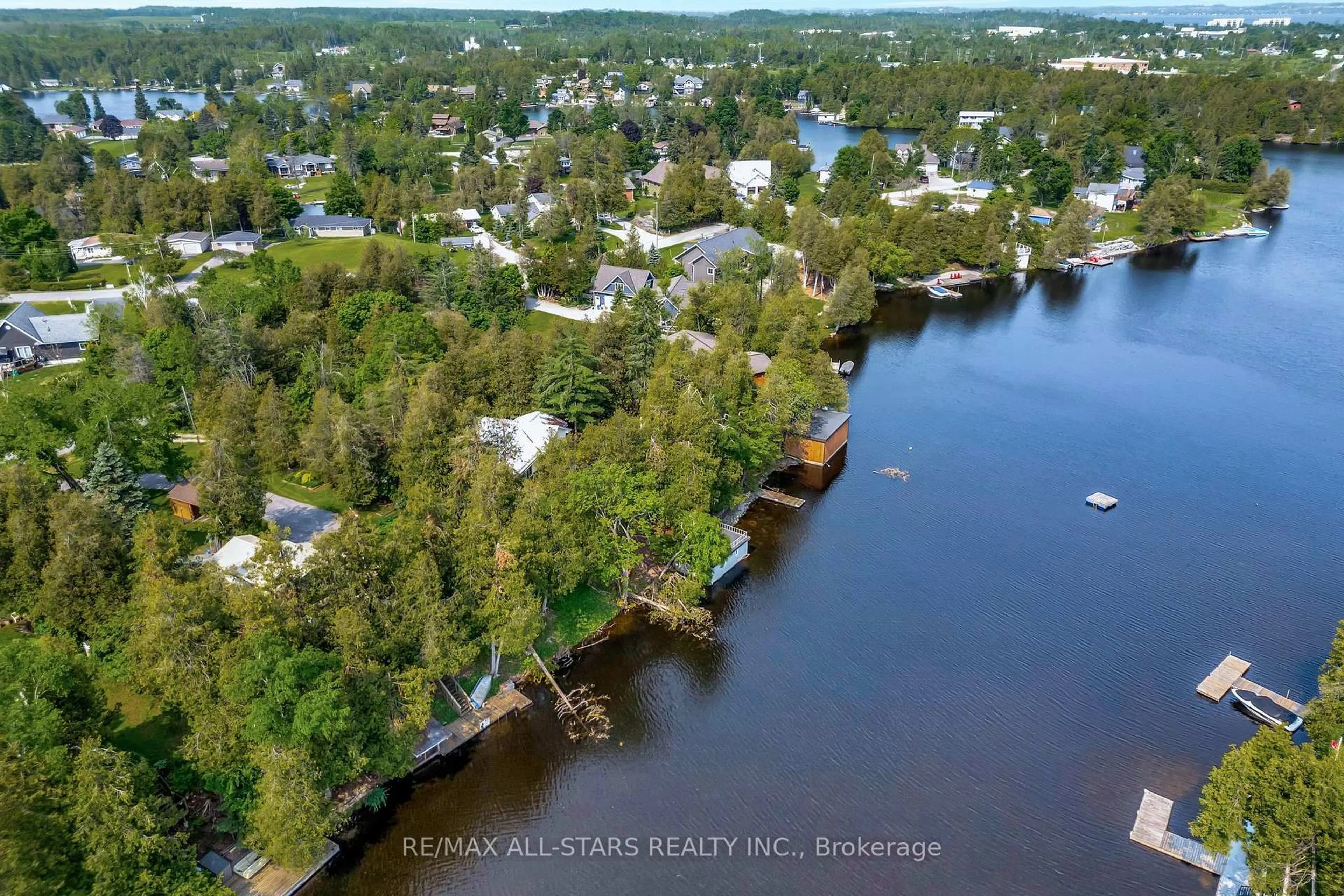 A pic from outside/outdoor area/front of a property/back of a property/a pic from drone, water/lake/river/ocean view for 14 Wychwood Dr, Kawartha Lakes Ontario K0M 1N0