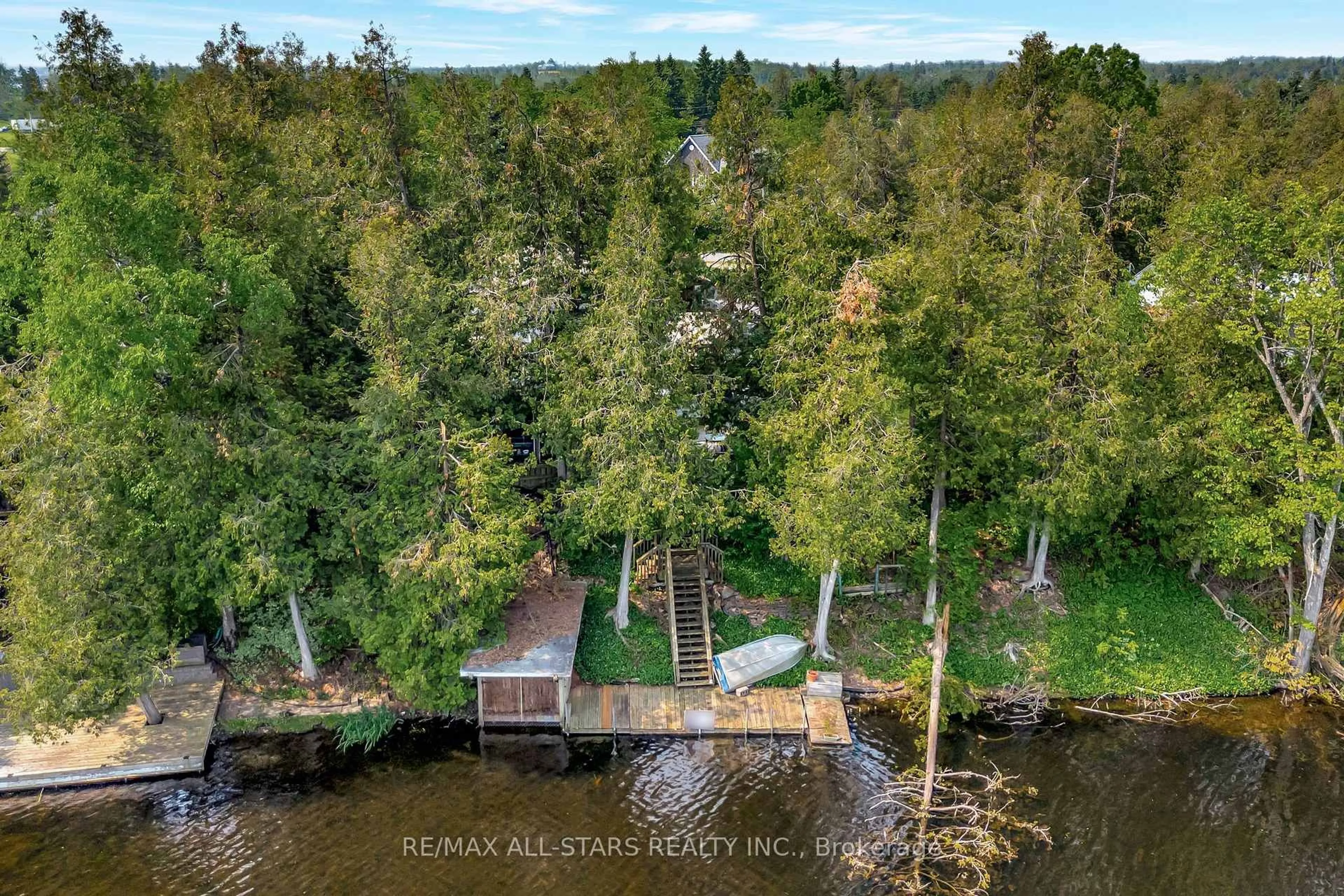 A pic from outside/outdoor area/front of a property/back of a property/a pic from drone, water/lake/river/ocean view for 14 Wychwood Dr, Kawartha Lakes Ontario K0M 1N0