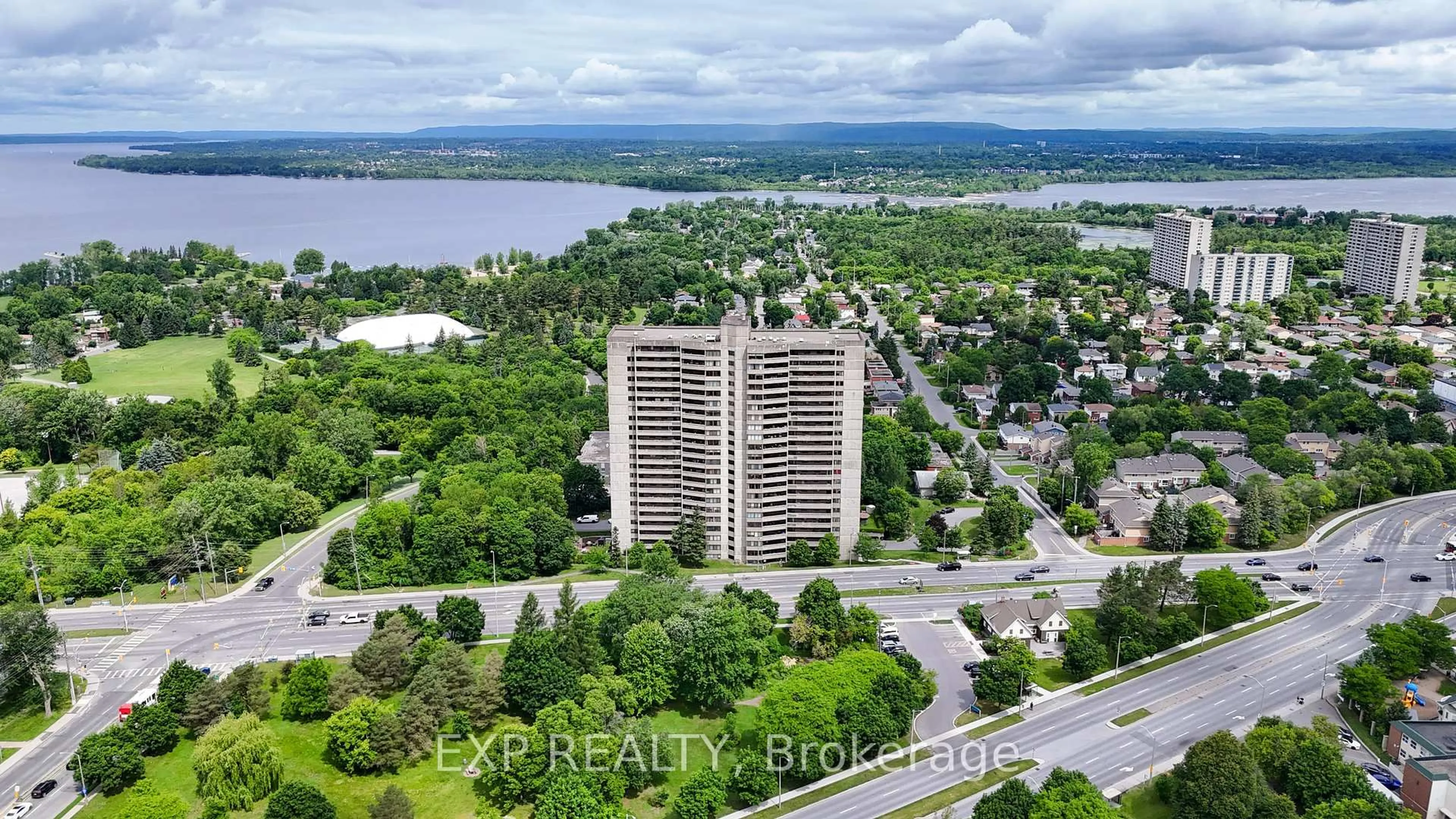 A pic from outside/outdoor area/front of a property/back of a property/a pic from drone, water/lake/river/ocean view for 415 Greenview Ave #101, Ottawa Ontario K2B 8G5