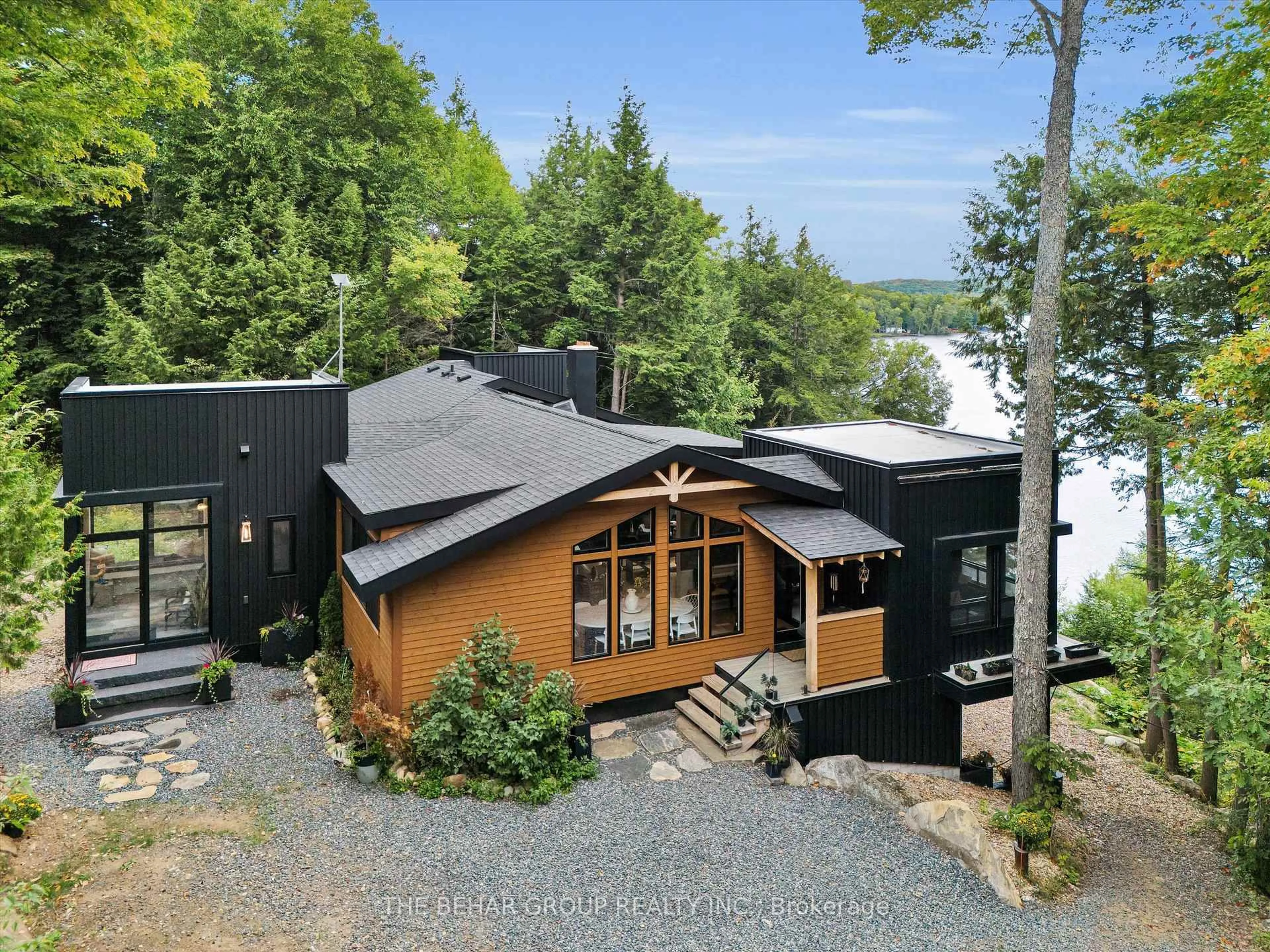 A pic from outside/outdoor area/front of a property/back of a property/a pic from drone, water/lake/river/ocean view for 1311 S Ril Lake Rd, Lake of Bays Ontario P0B 1A0