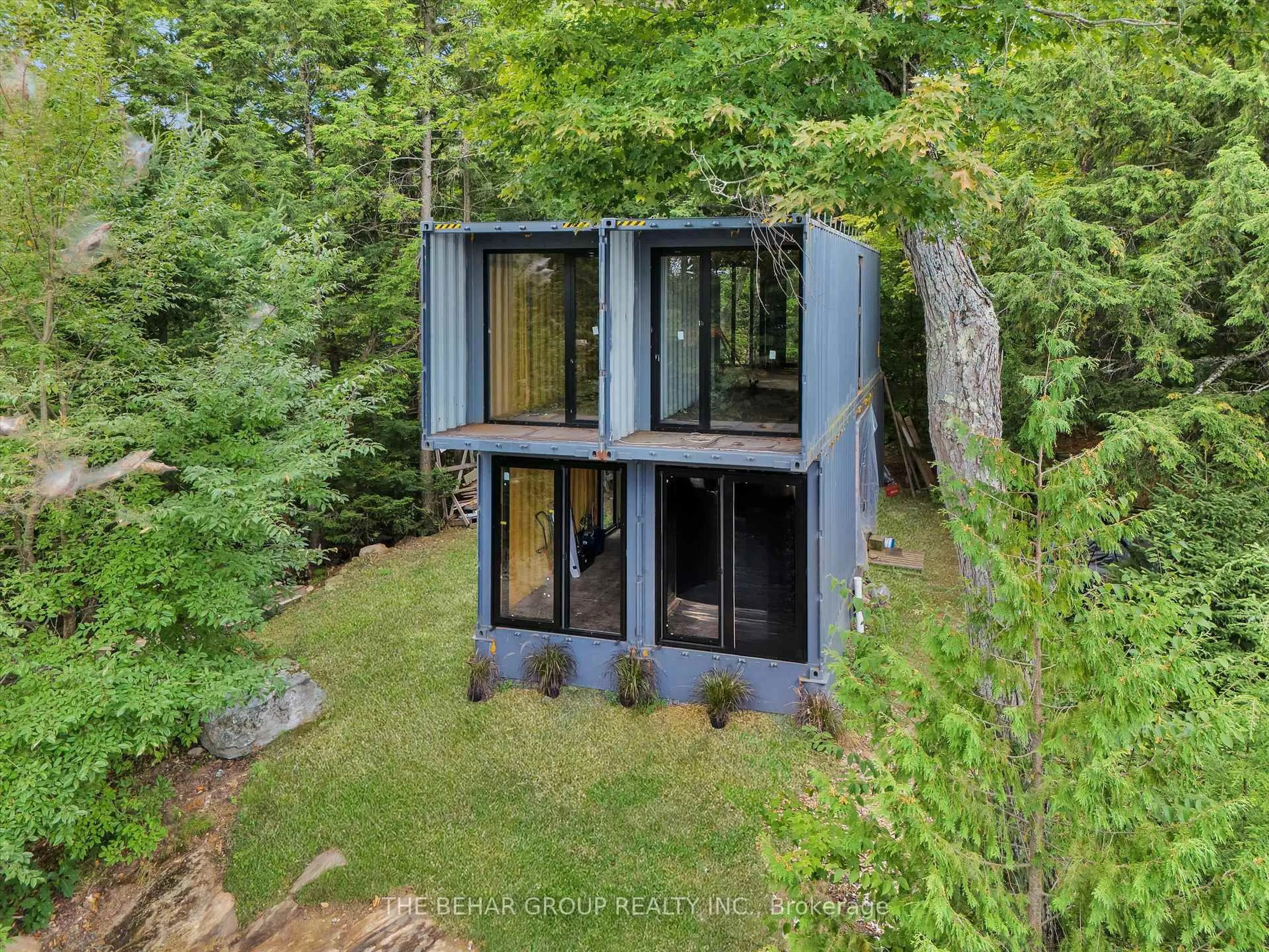A pic from outside/outdoor area/front of a property/back of a property/a pic from drone, forest/trees view for 1311 S Ril Lake Rd, Lake of Bays Ontario P0B 1A0