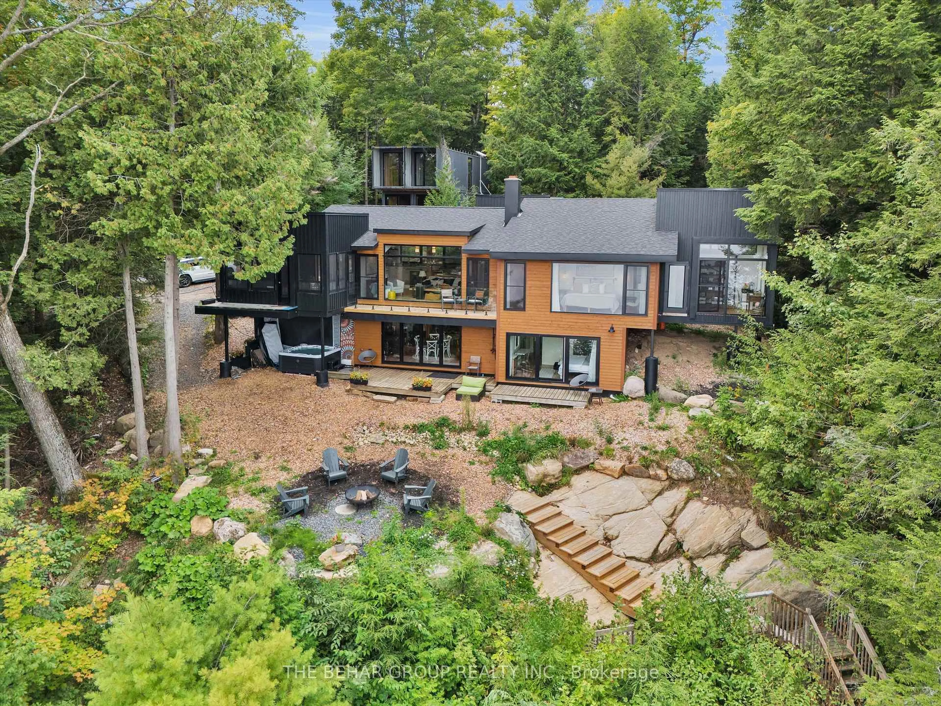 A pic from outside/outdoor area/front of a property/back of a property/a pic from drone, forest/trees view for 1311 S Ril Lake Rd, Lake of Bays Ontario P0B 1A0