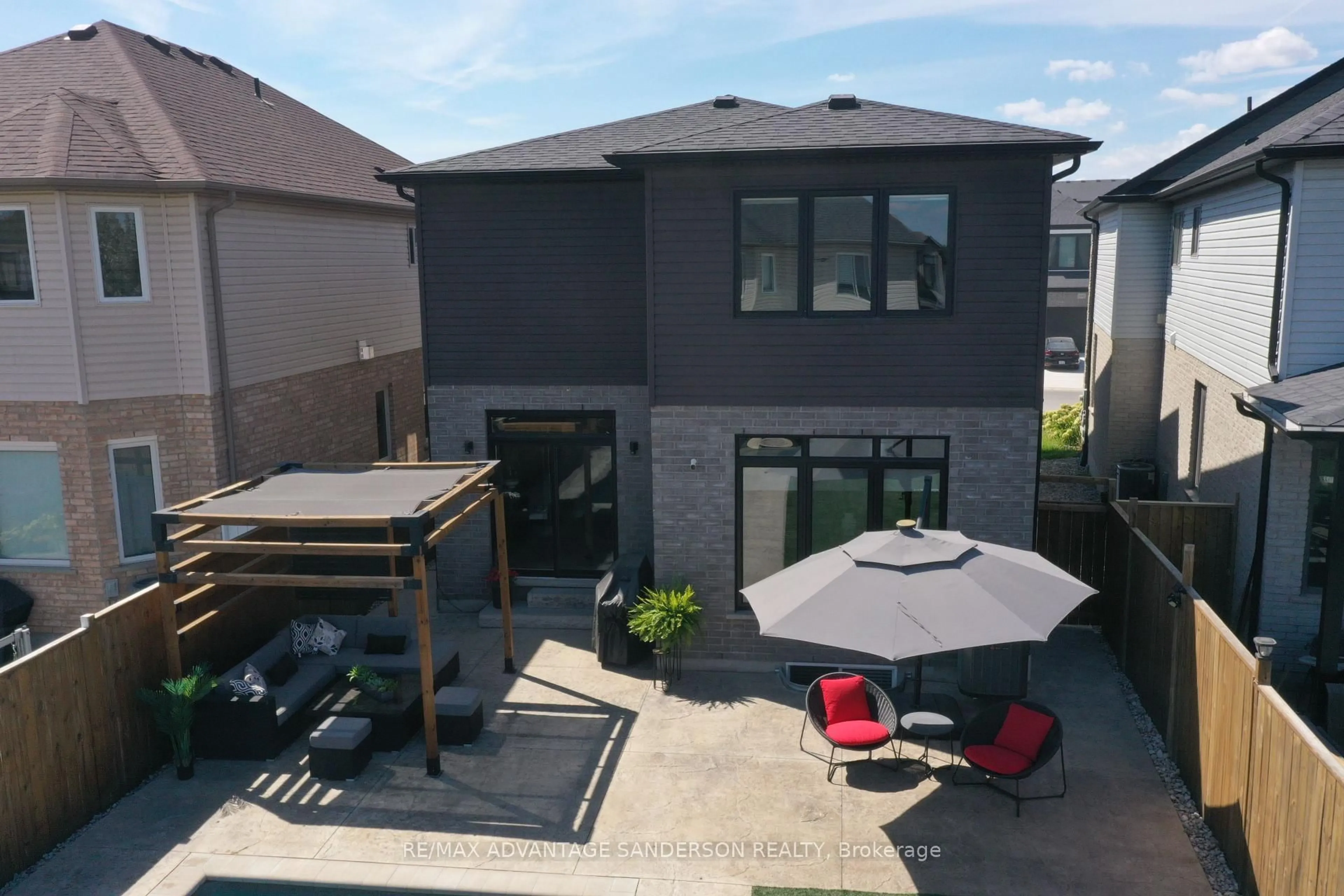 A pic from outside/outdoor area/front of a property/back of a property/a pic from drone, street for 3450 Paulpeel Ave, London South Ontario N6L 0E2