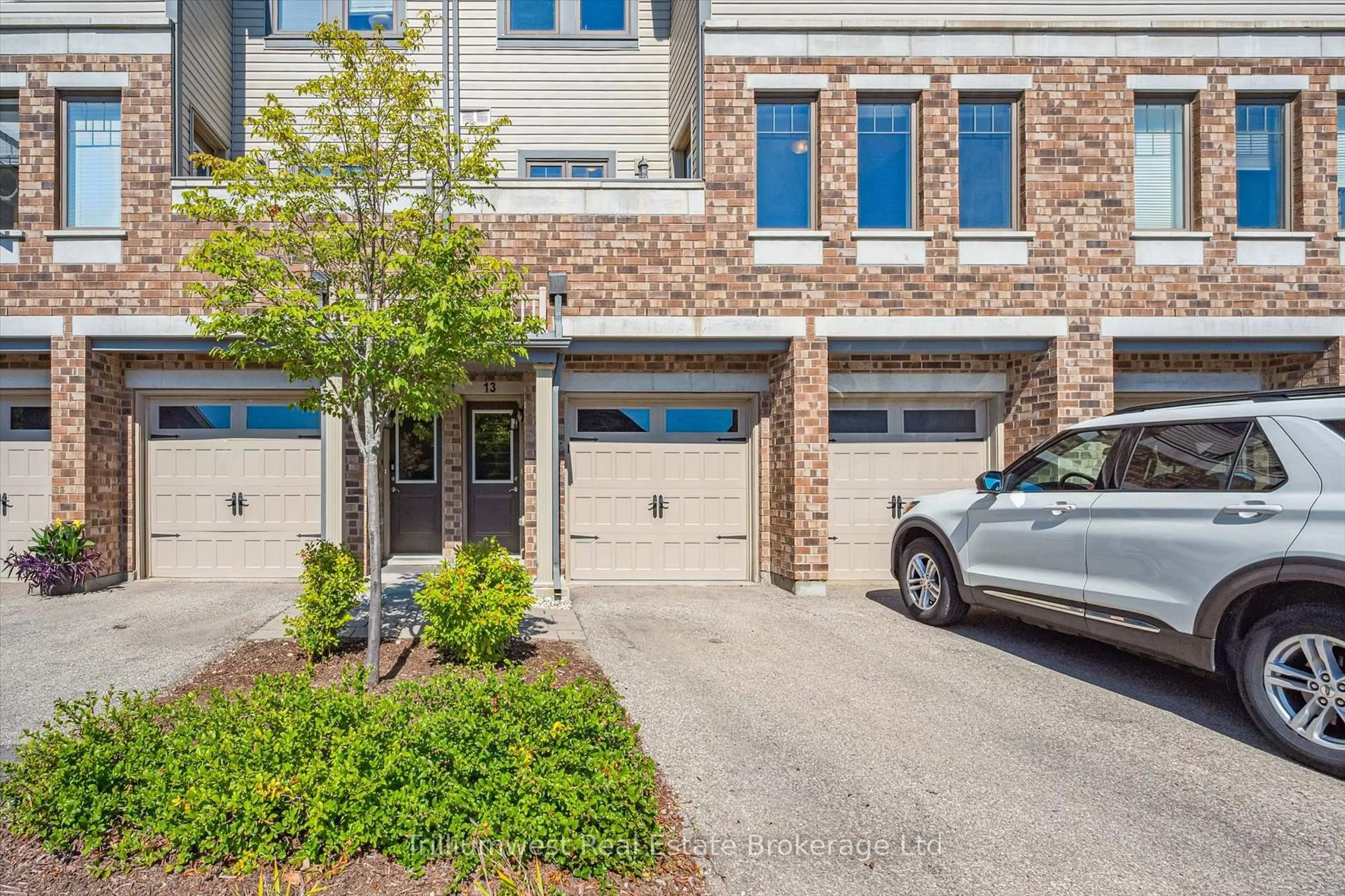 Home with brick exterior material, street for 39 Kay Cres #13, Guelph Ontario N1L 0N5