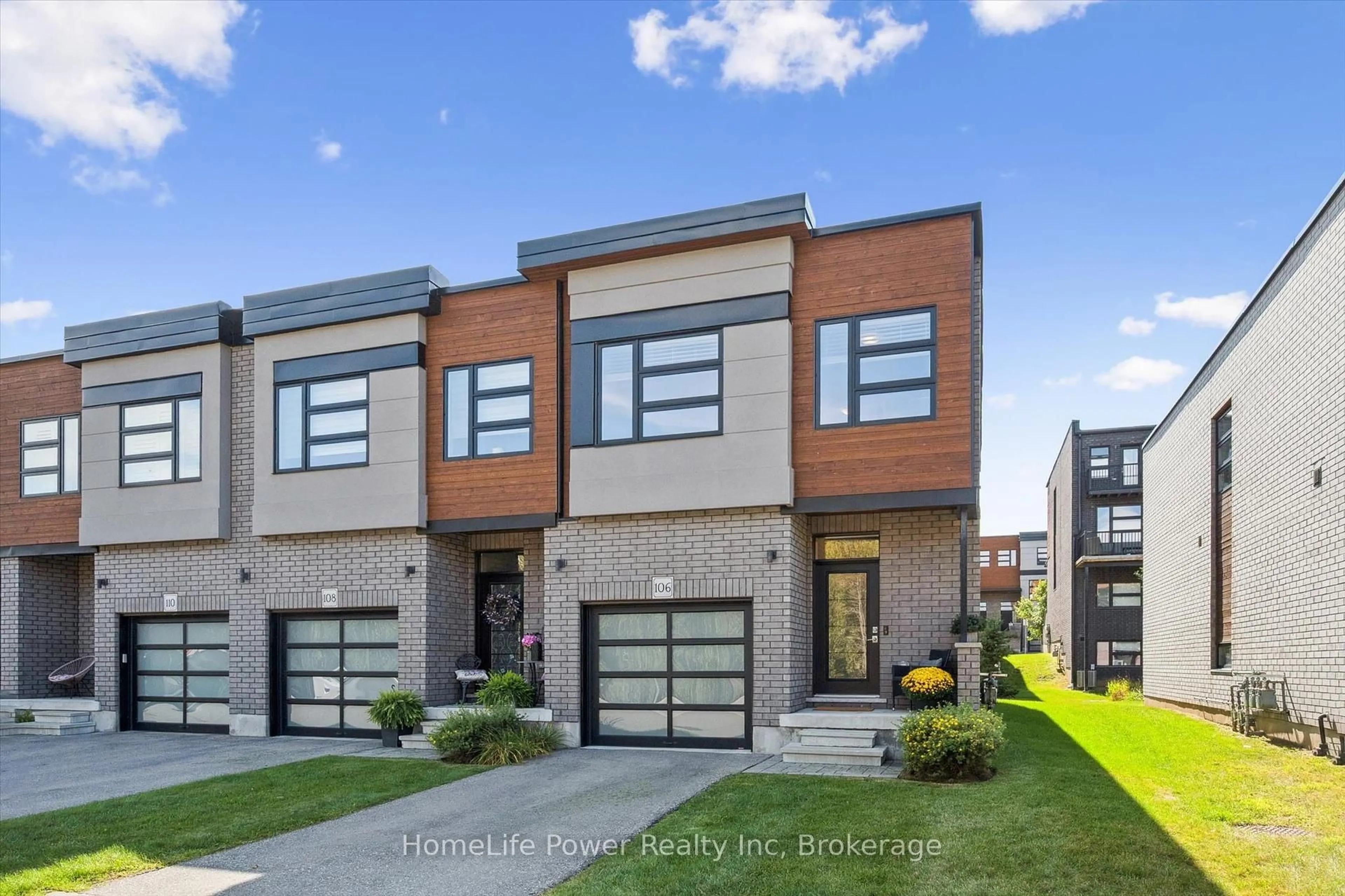 Home with brick exterior material, street for 60 Arkell Rd #106, Guelph Ontario N1L 0N7
