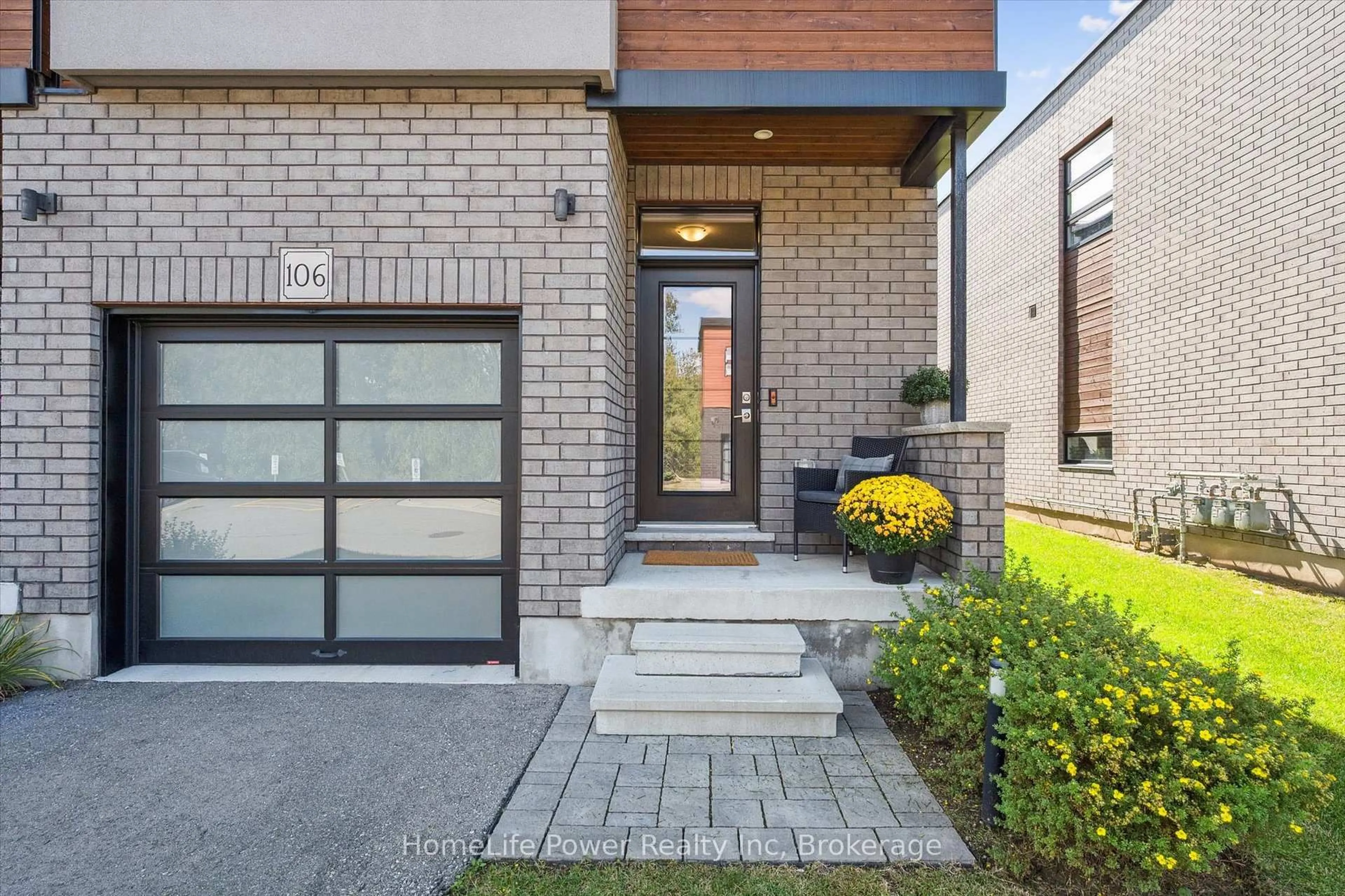 Home with brick exterior material, street for 60 Arkell Rd #106, Guelph Ontario N1L 0N7